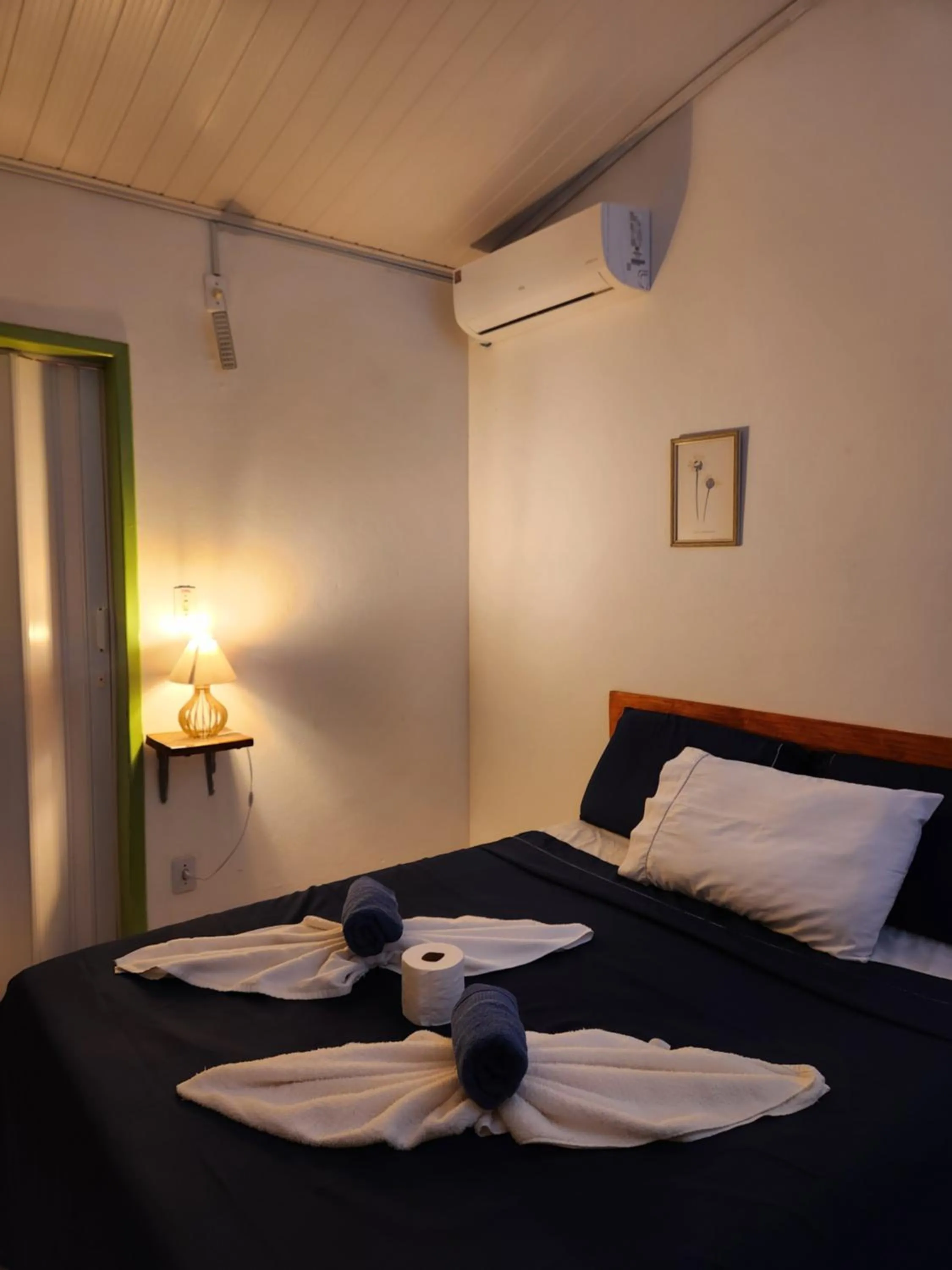 Bed in Pousada Velho Garimpo