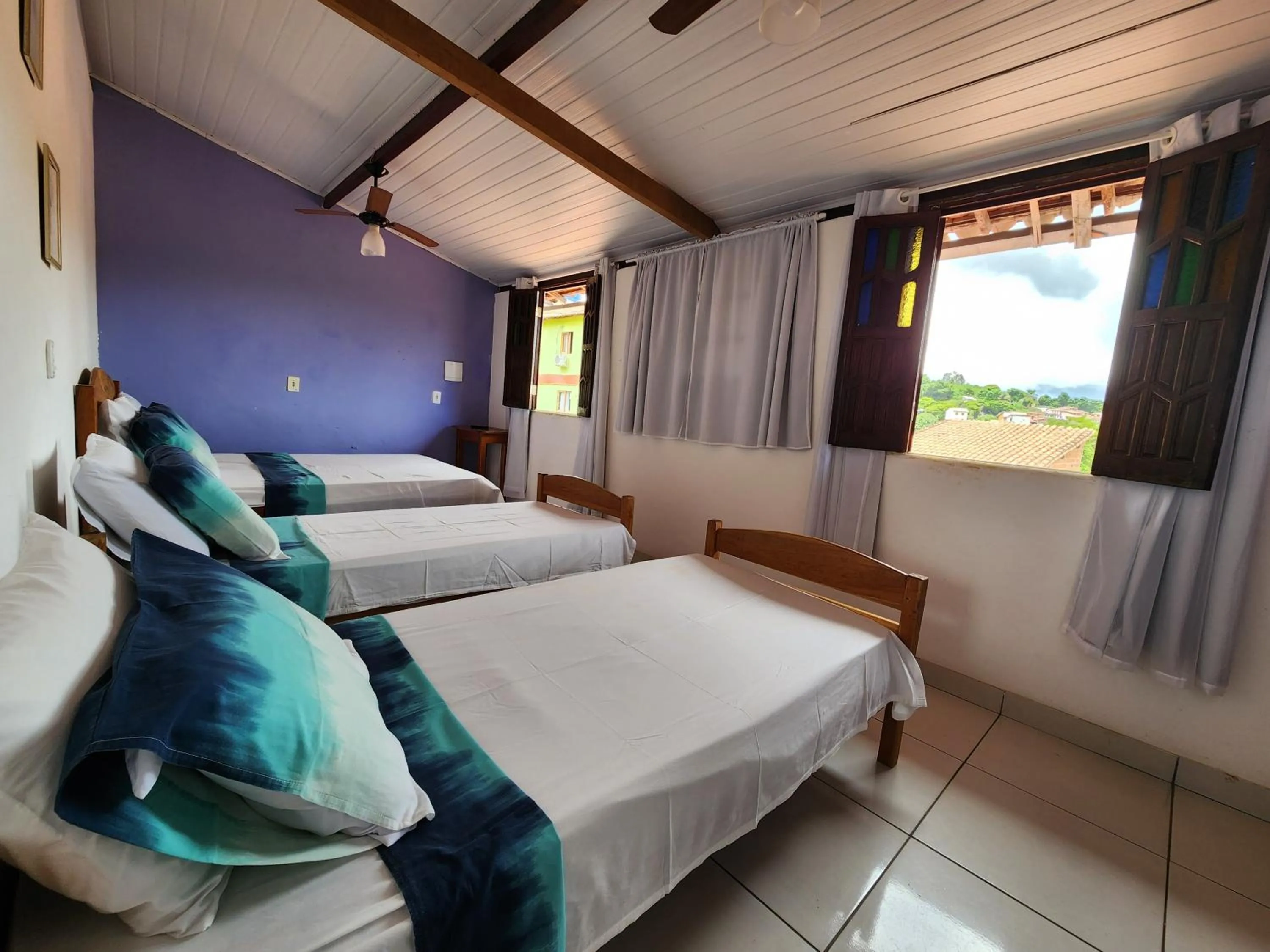 Bed in Pousada Velho Garimpo