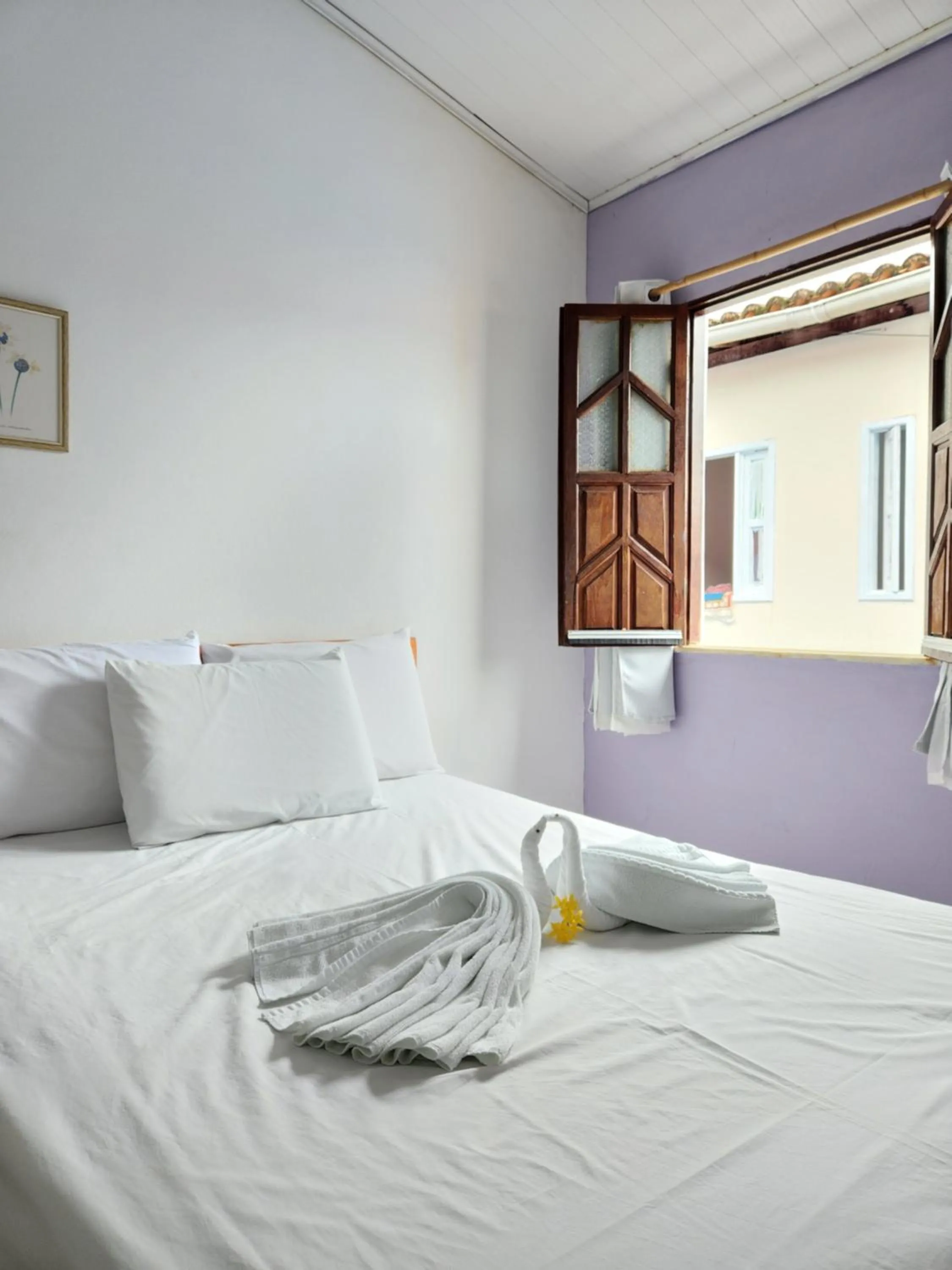 Bed in Pousada Velho Garimpo