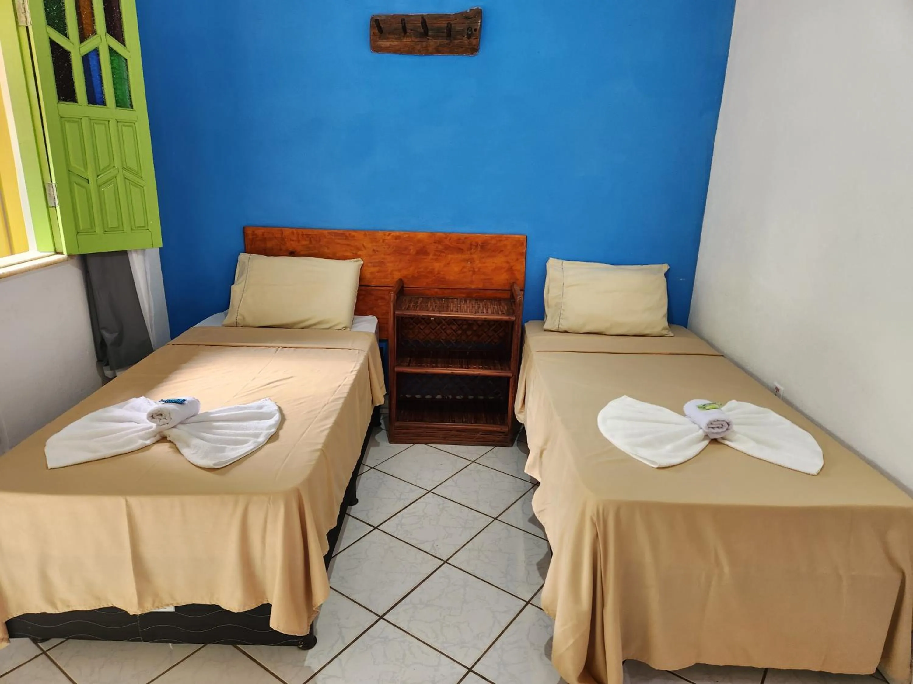 Bed in Pousada Velho Garimpo