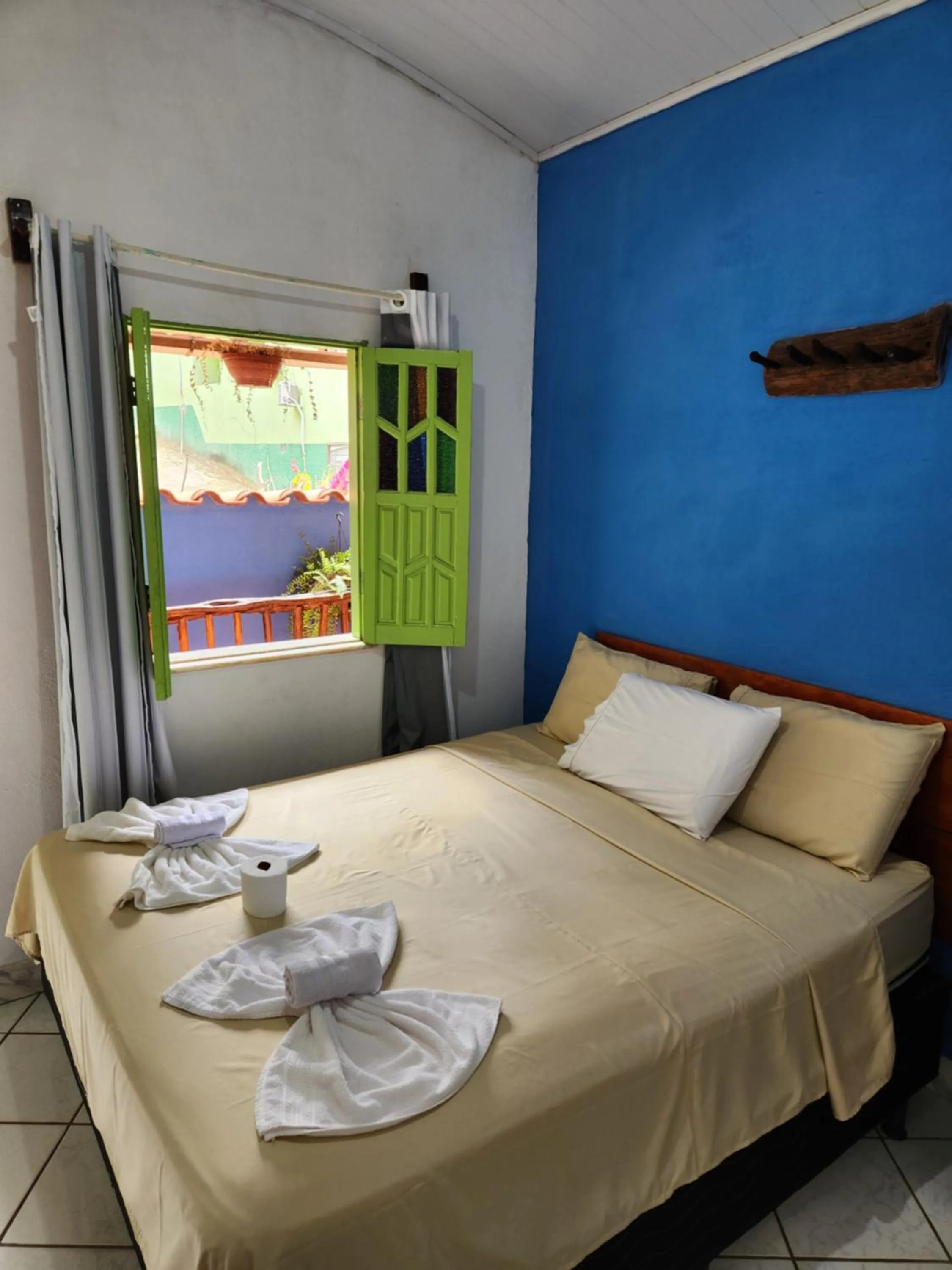 Bed in Pousada Velho Garimpo