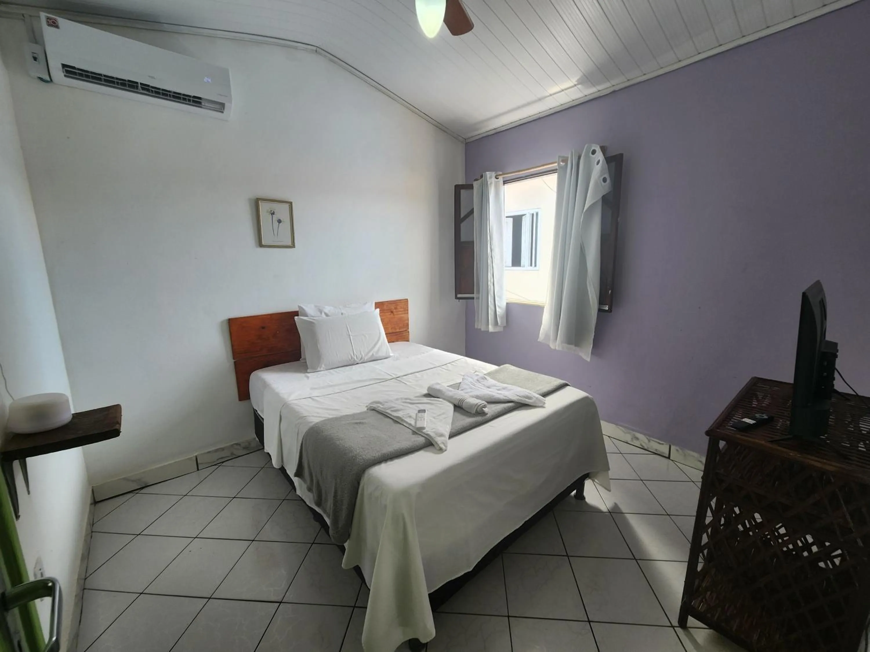 Photo of the whole room, Bed in Pousada Velho Garimpo