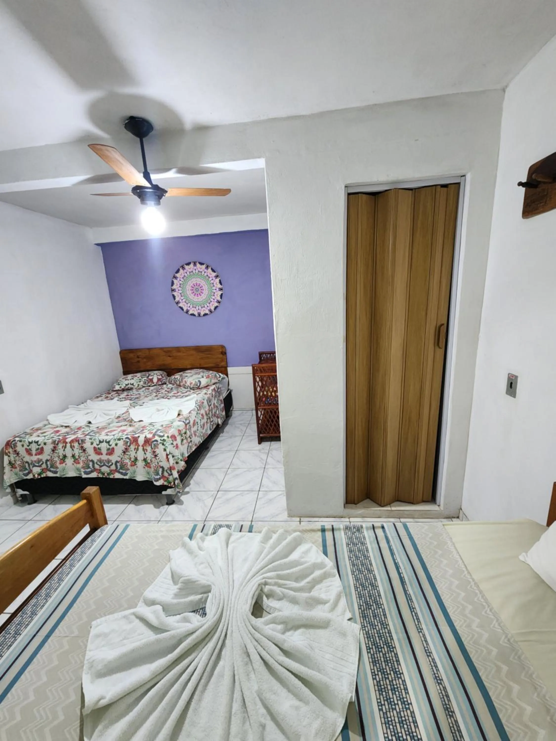 Bed in Pousada Velho Garimpo