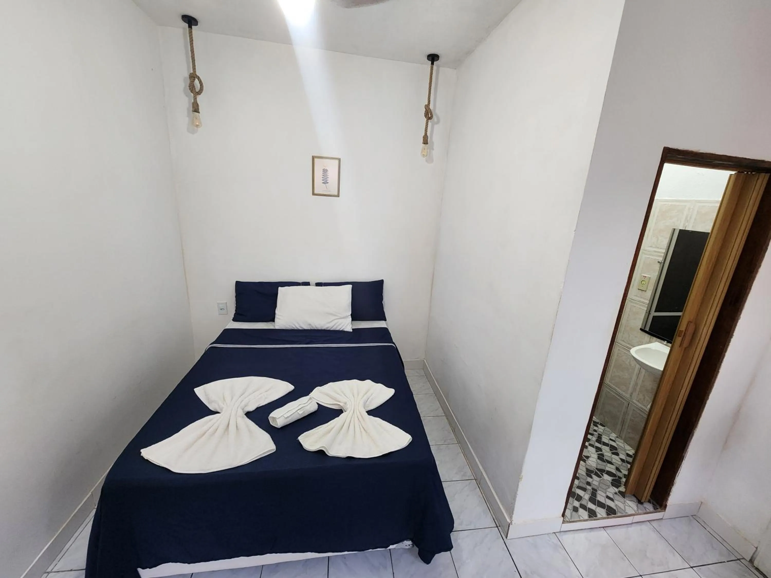 Bed in Pousada Velho Garimpo