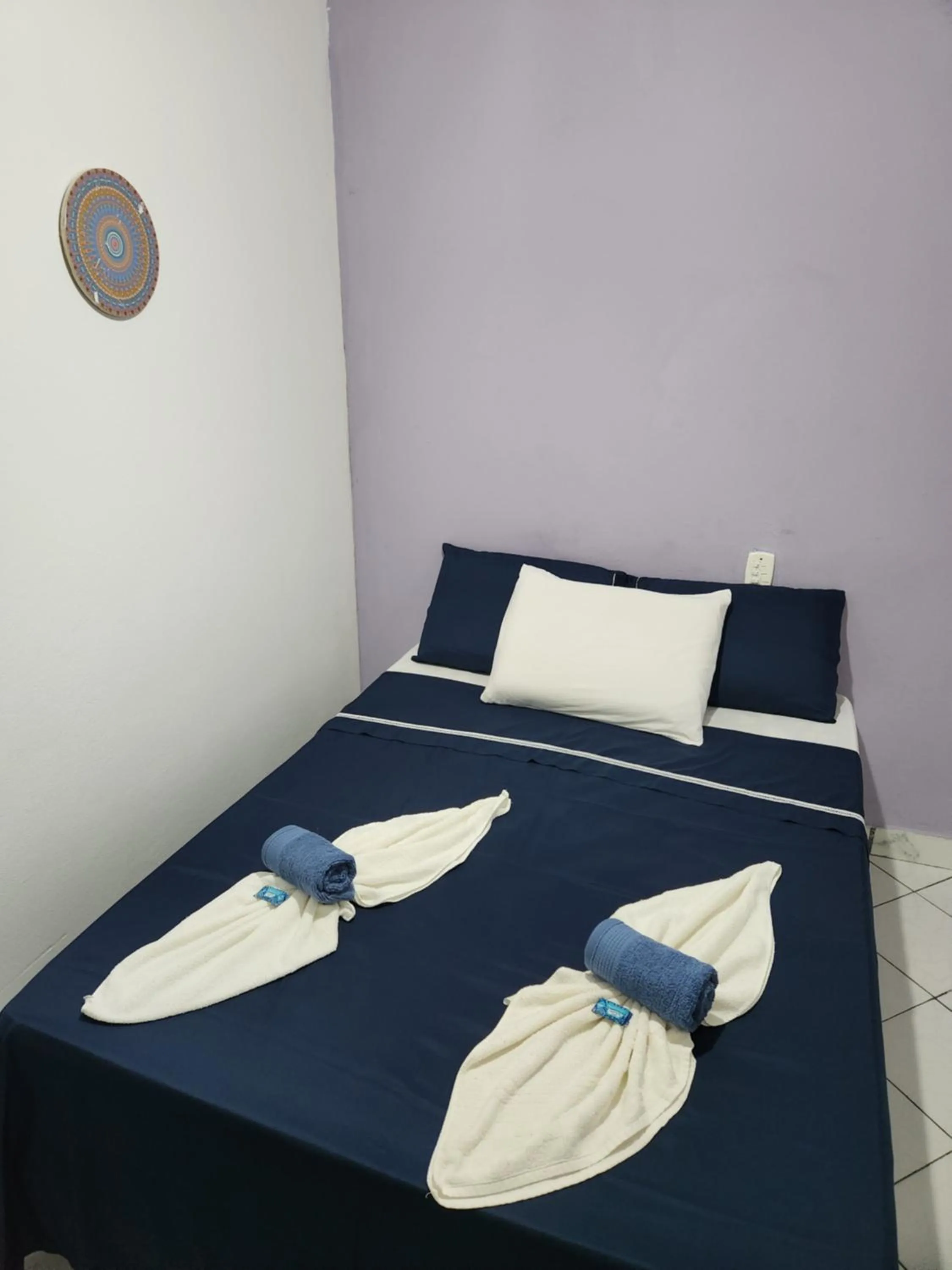Bed in Pousada Velho Garimpo