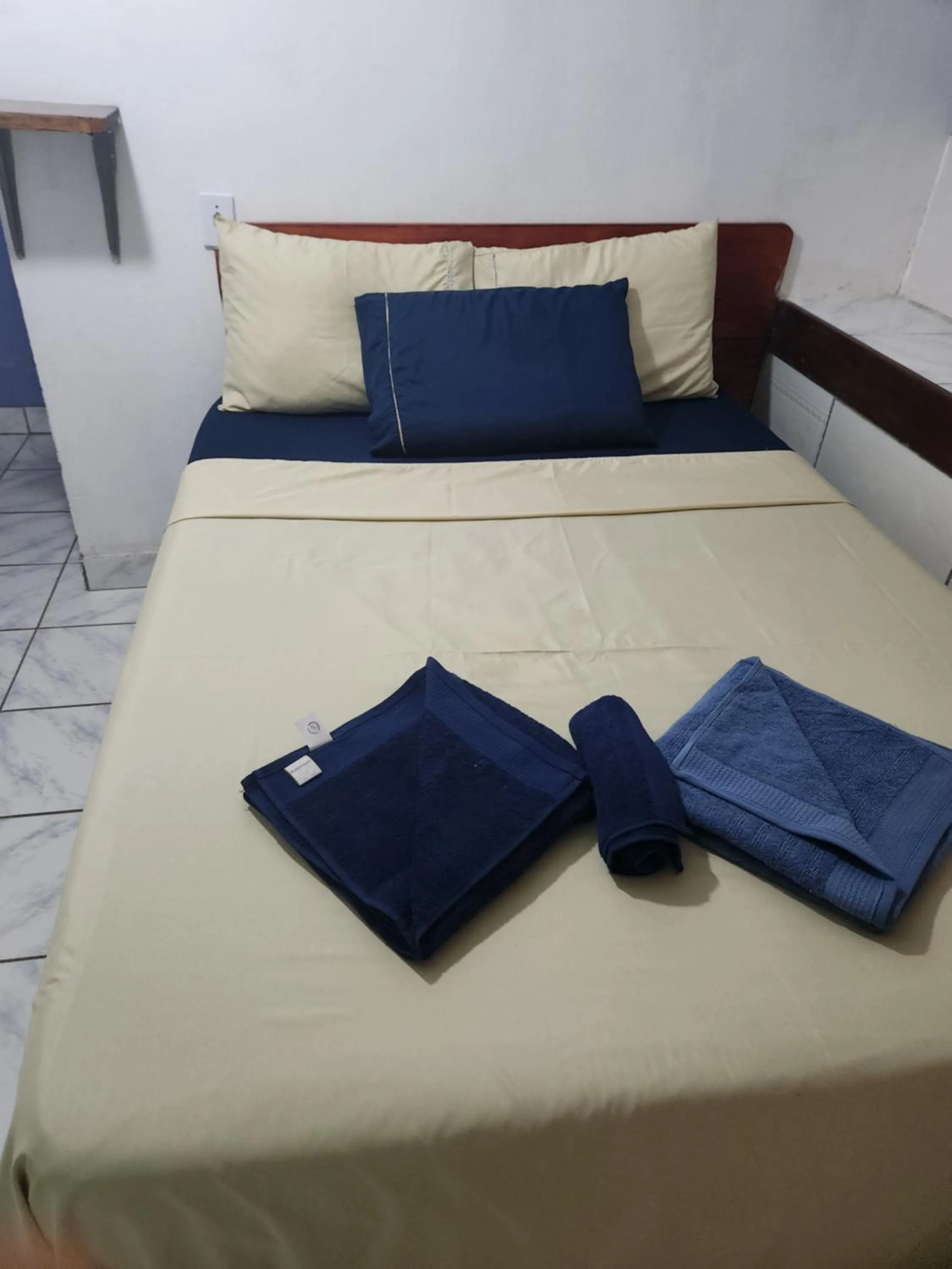 Bed in Pousada Velho Garimpo