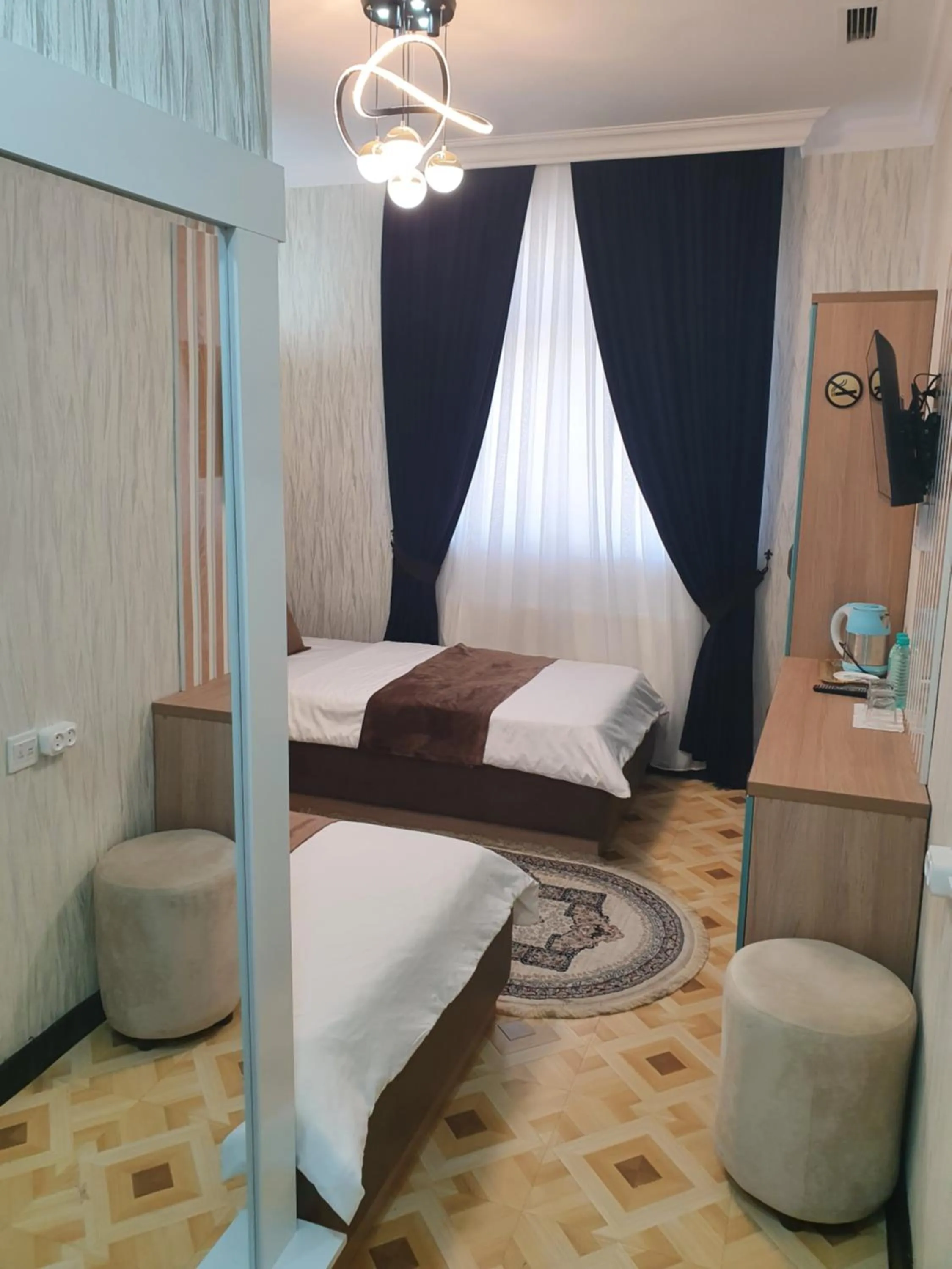 Photo of the whole room, Bed in Reikartz Namangan