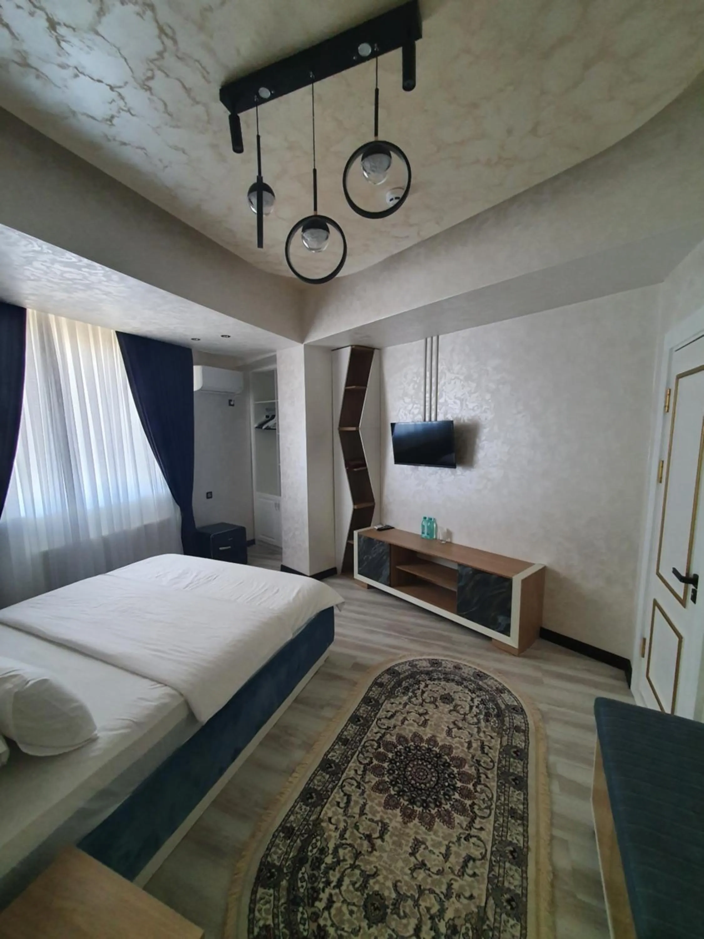 Photo of the whole room, Bed in Reikartz Namangan
