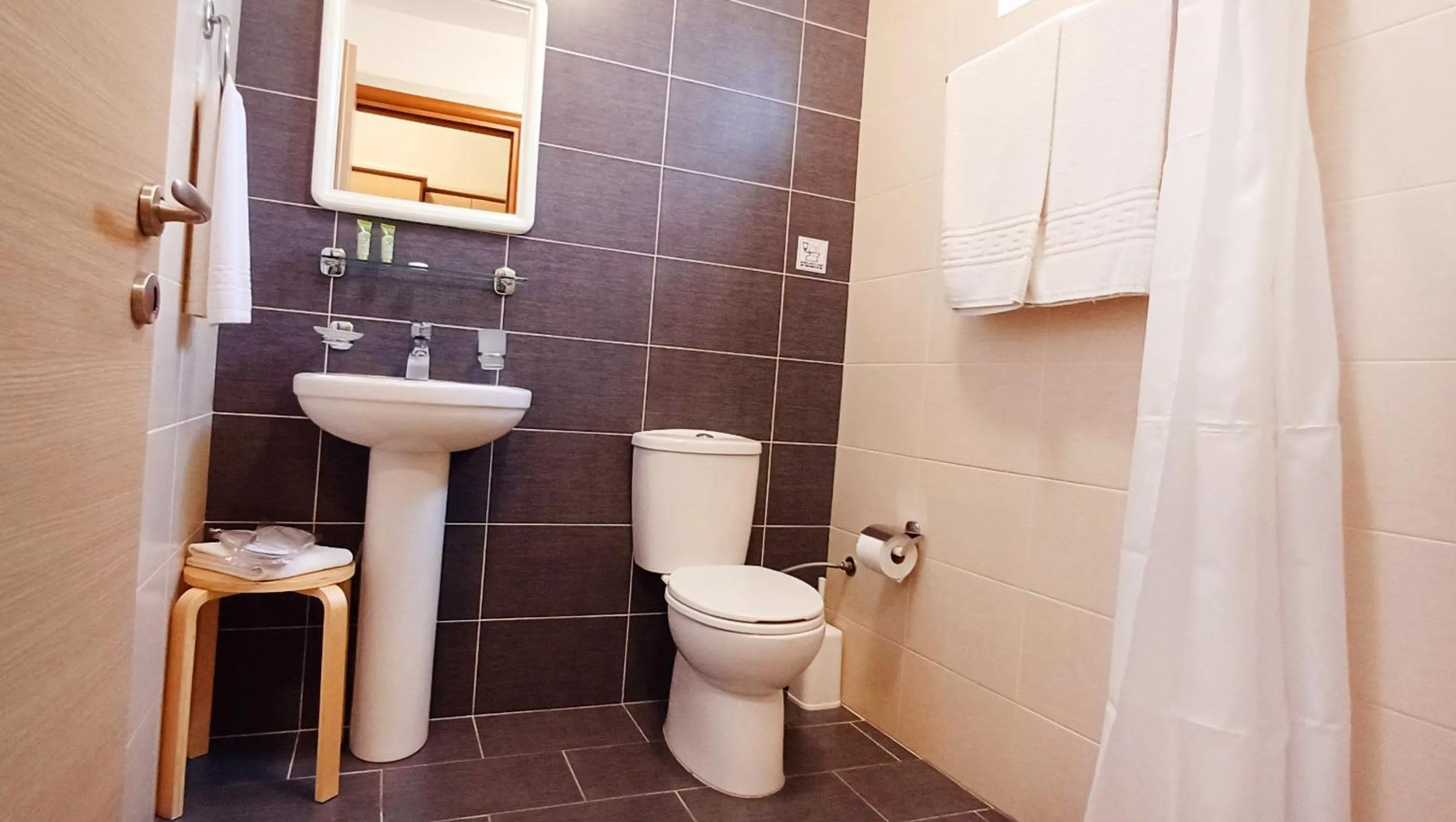 Bathroom in Arisvi All Seasons Hotel