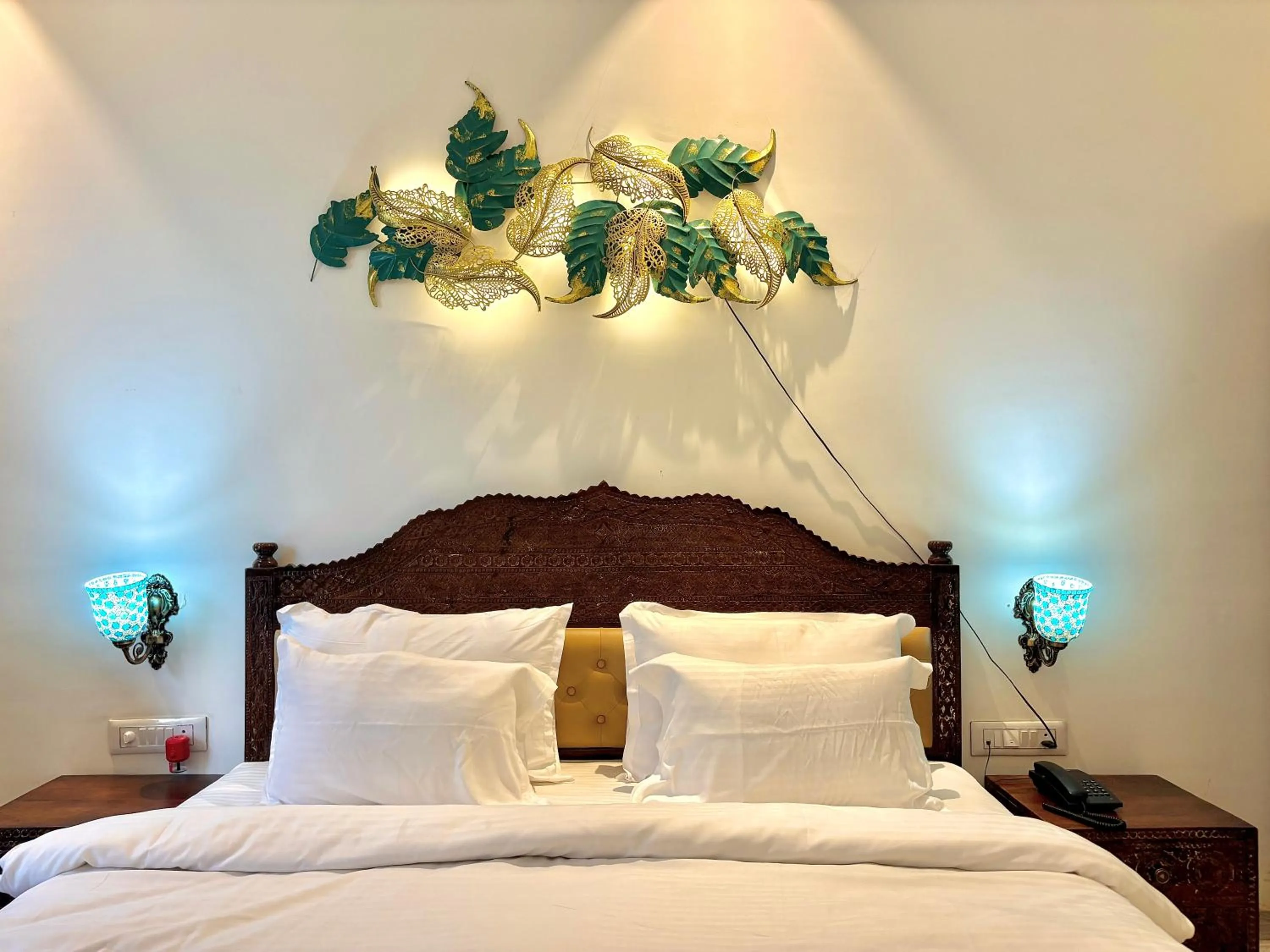 Bed in Misty Blue Resort and Villas