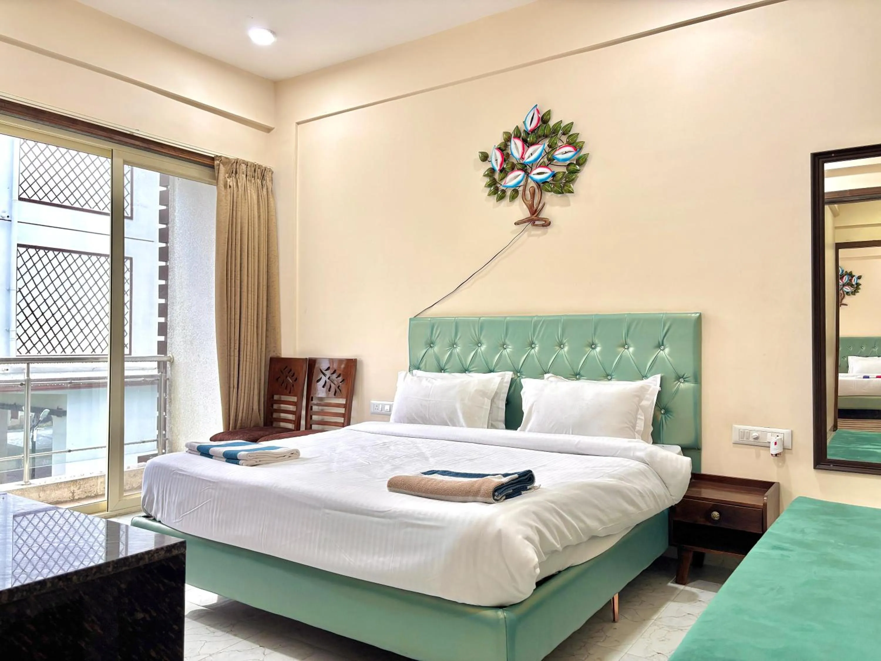 Bed in Misty Blue Resort and Villas