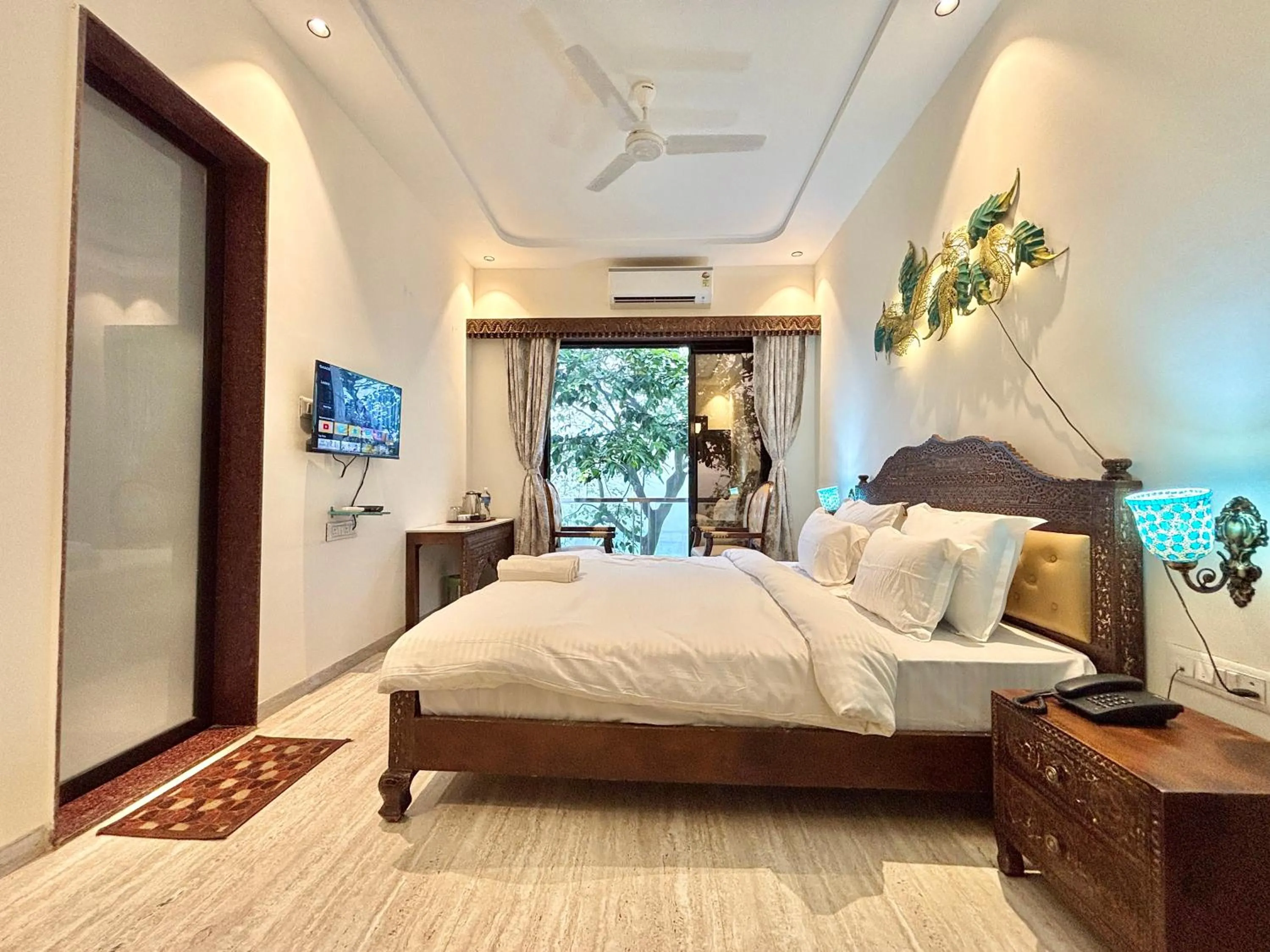 Bed in Misty Blue Resort and Villas