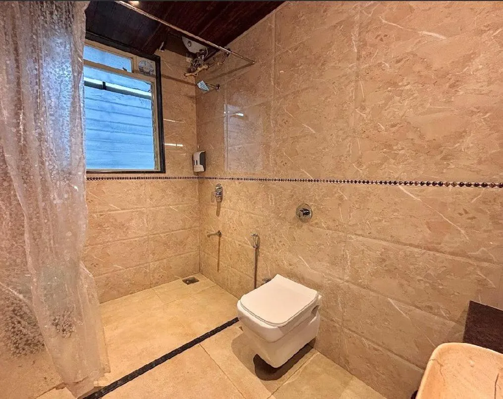 Toilet in Misty Blue Resort and Villas