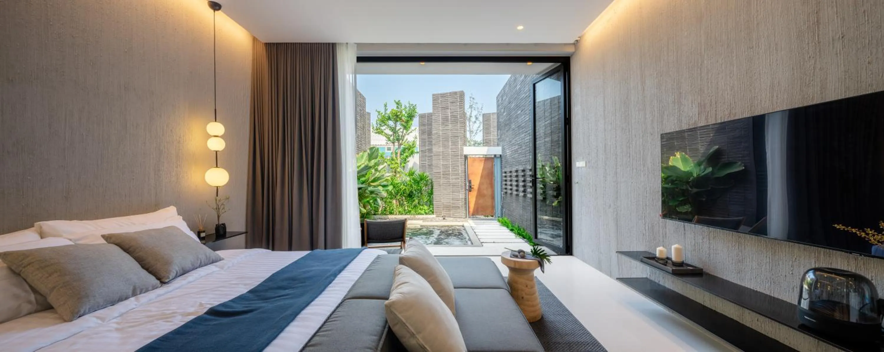 Bed in Rhy.a Private Pool Villa