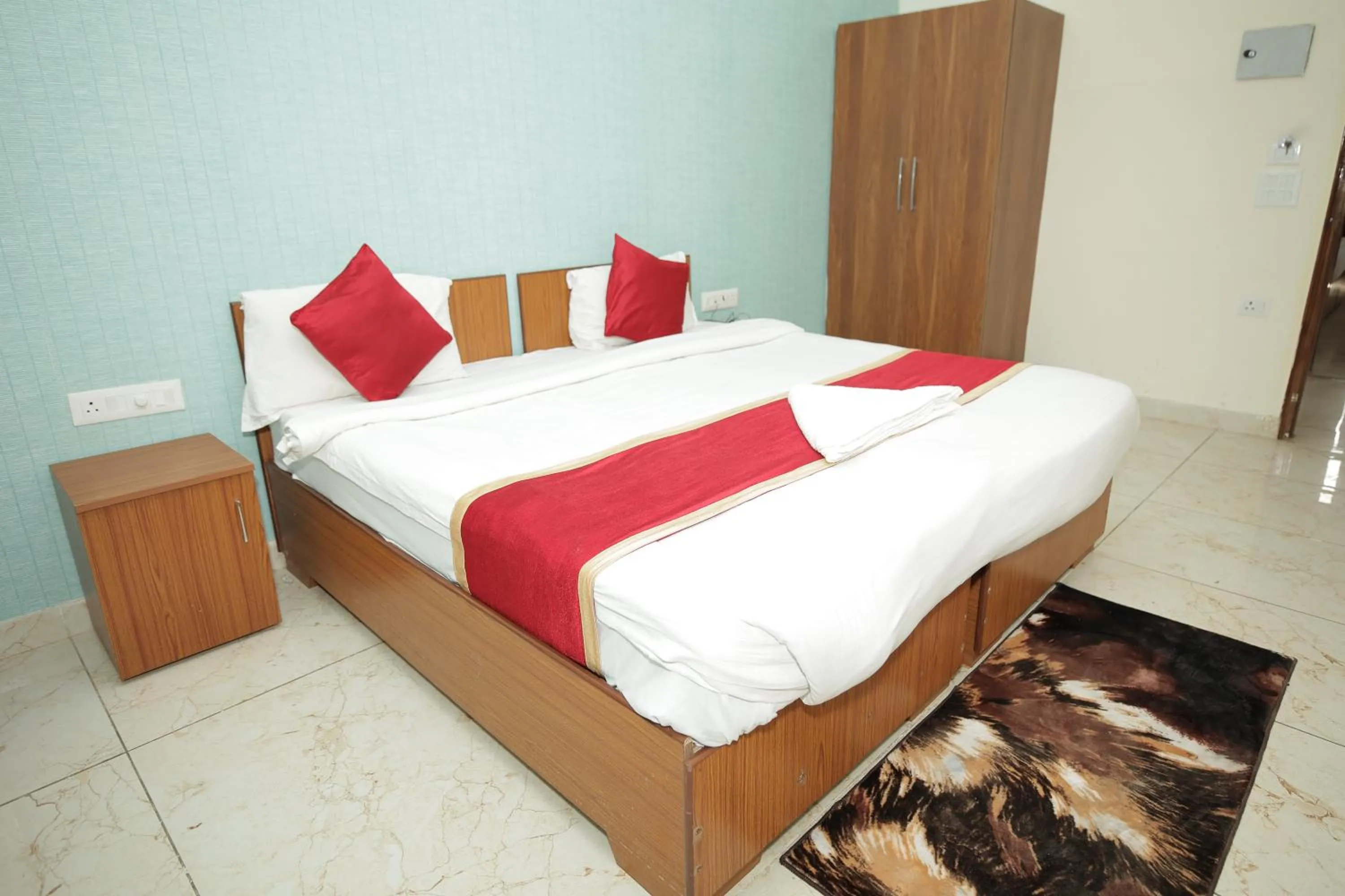 Photo of the whole room, Bed in Hotel The Anvi Residency Sector 122