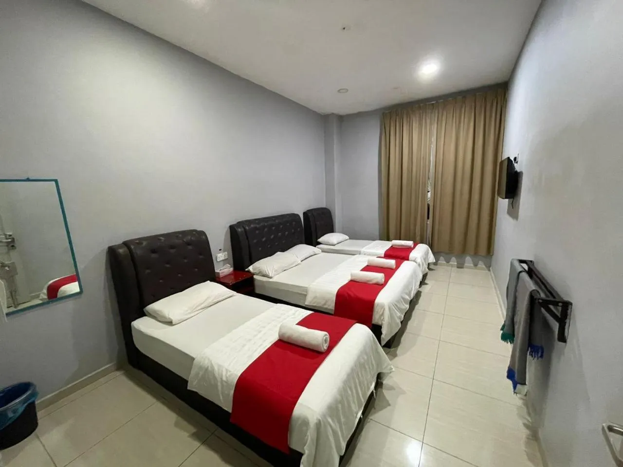 Bed in SZA INN HOTEL