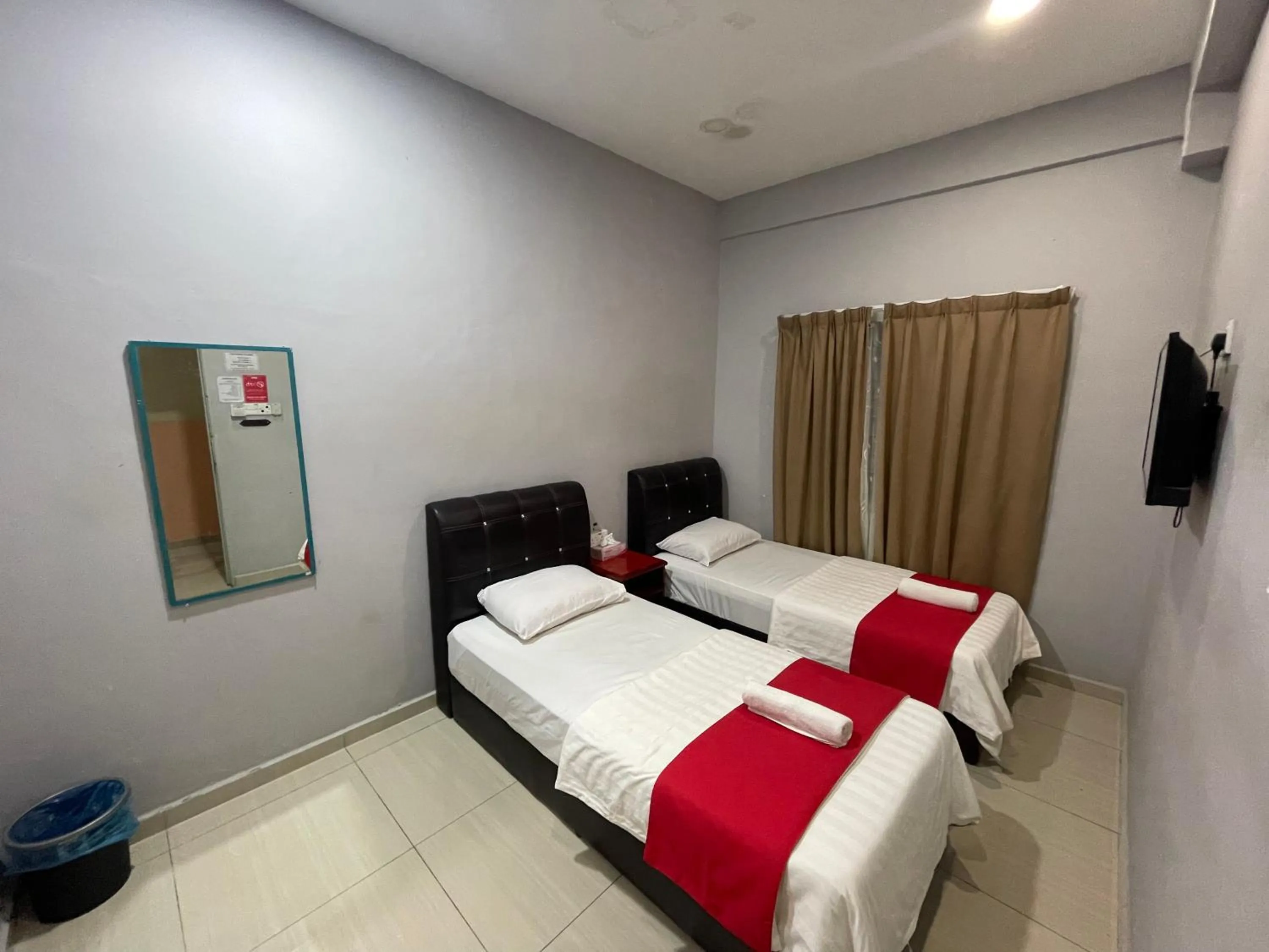 Bed in SZA INN HOTEL