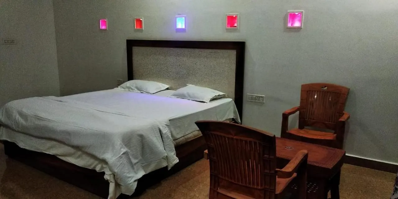 Bed in Hotel Radha Rani Mahal