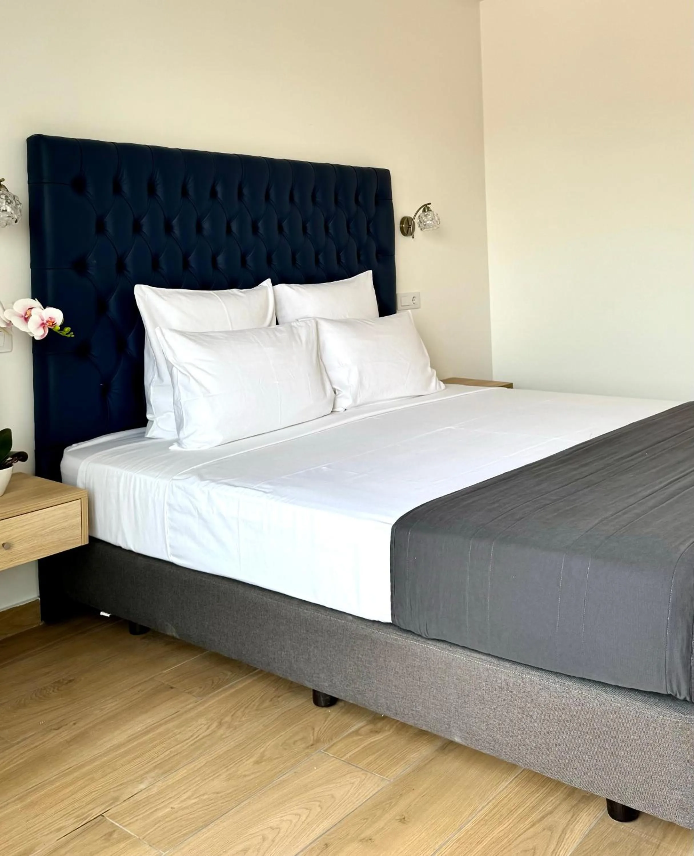 Bed in Hôtel Blue Sky
