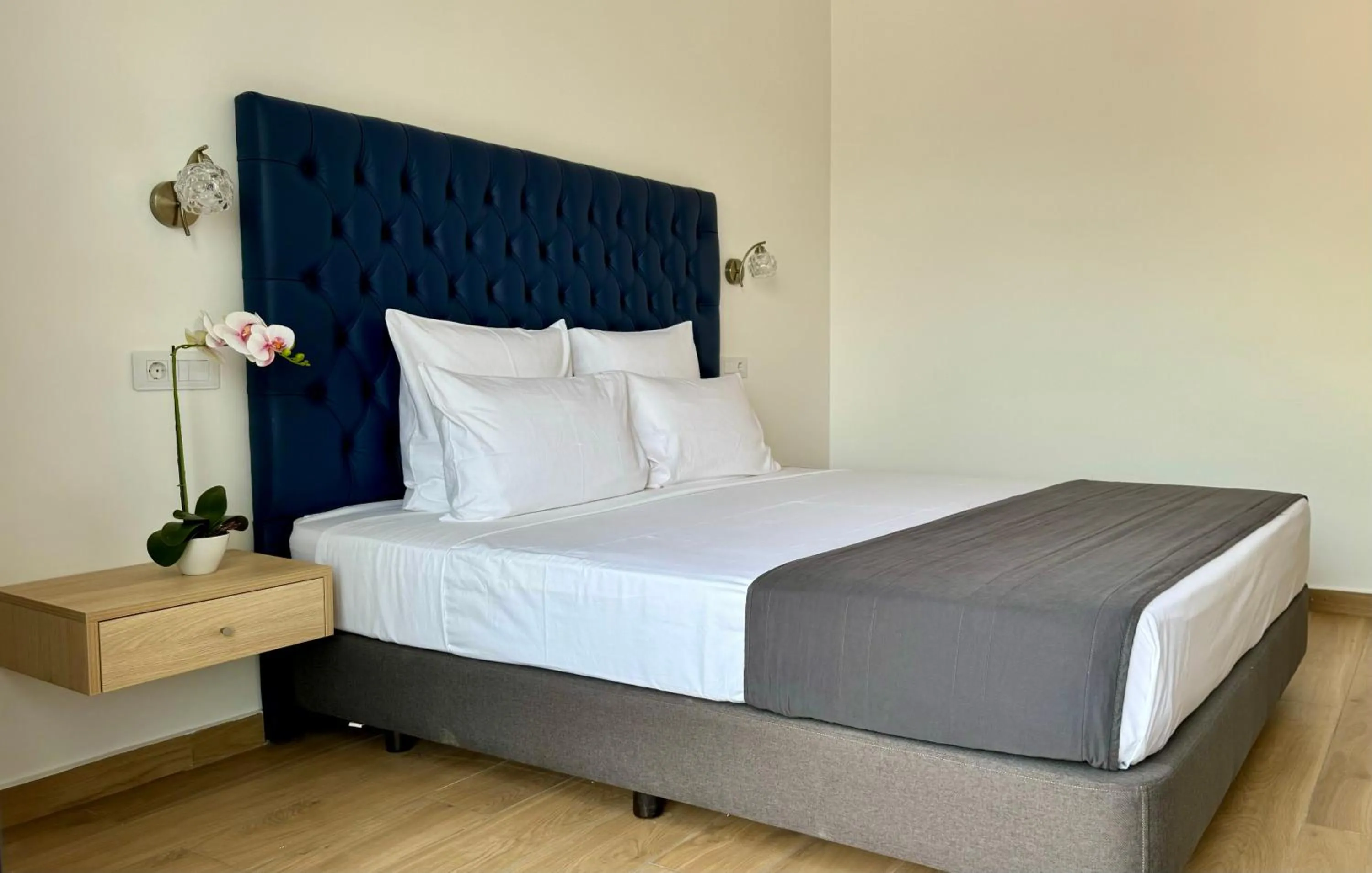 Bed in Hôtel Blue Sky