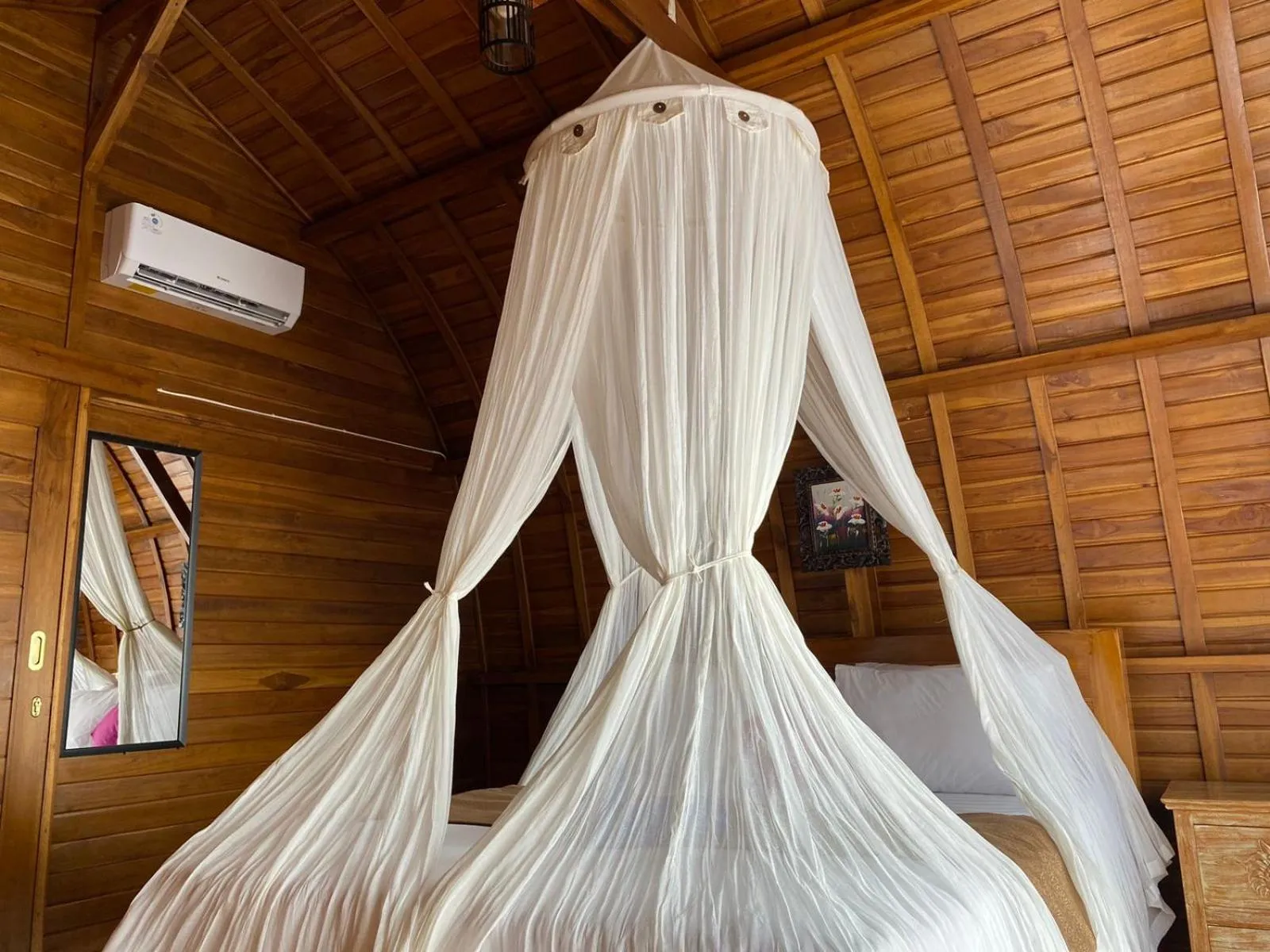 Bedroom in Suwehan Beach Cliff House by BIJAK