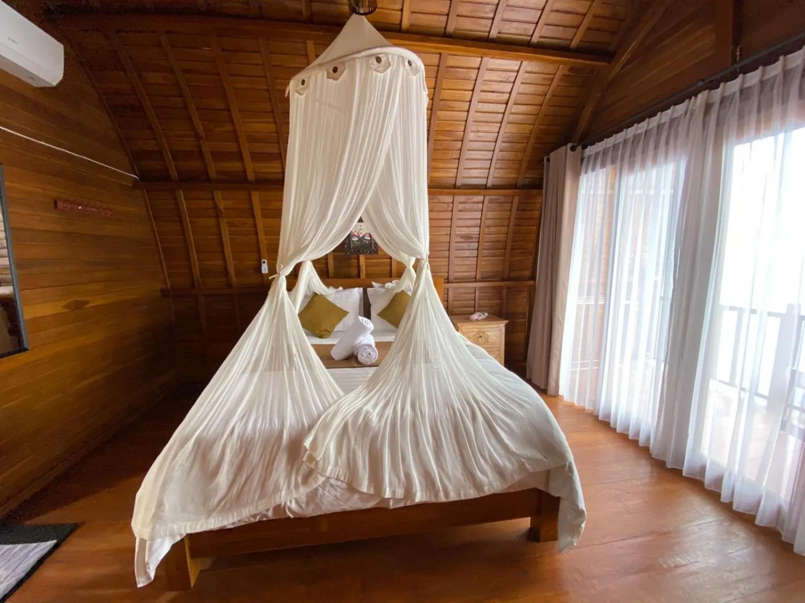 Bed in Suwehan Beach Cliff House by BIJAK