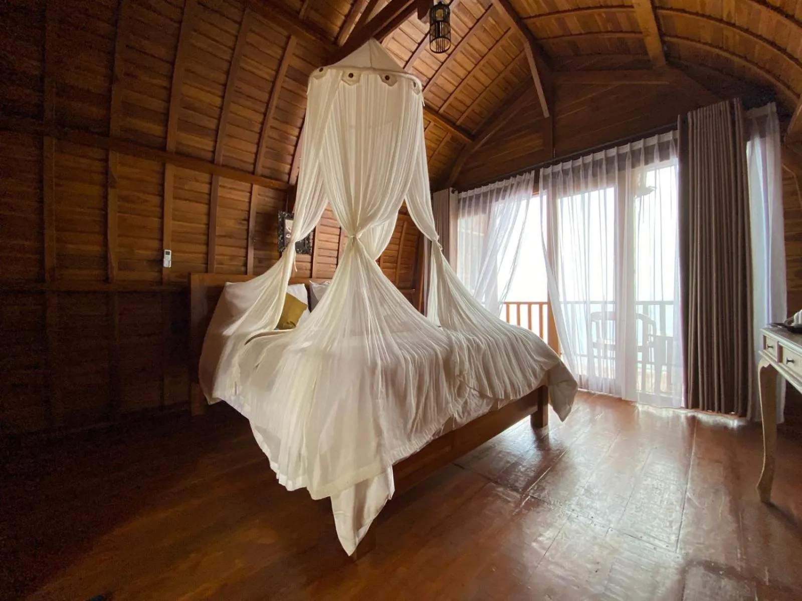 Bed in Suwehan Beach Cliff House by BIJAK