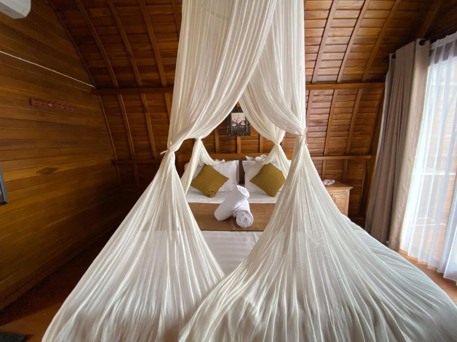 Bed in Suwehan Beach Cliff House by BIJAK