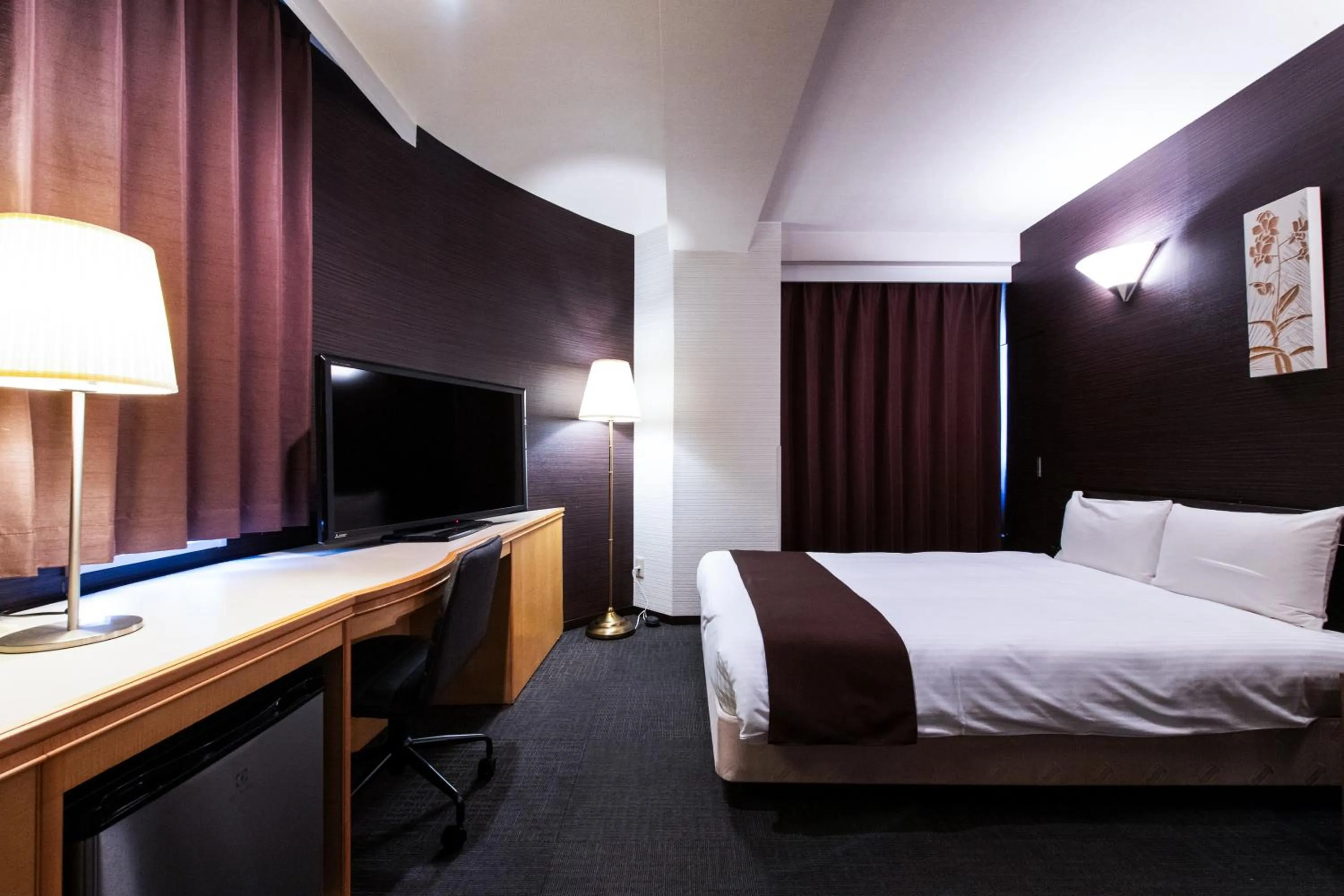Photo of the whole room, Bed in Urvest Hotel Kamata