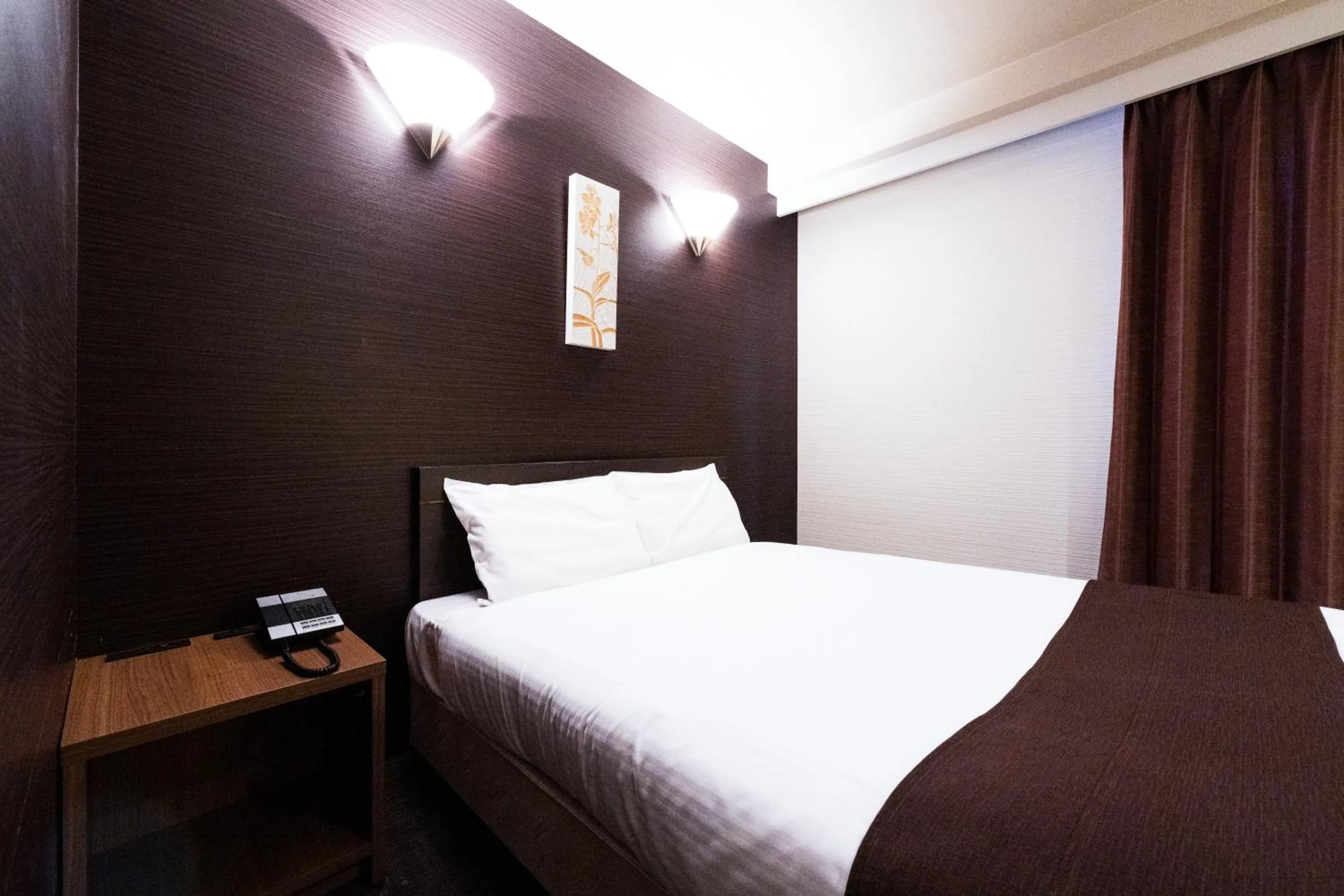Photo of the whole room, Bed in Urvest Hotel Kamata