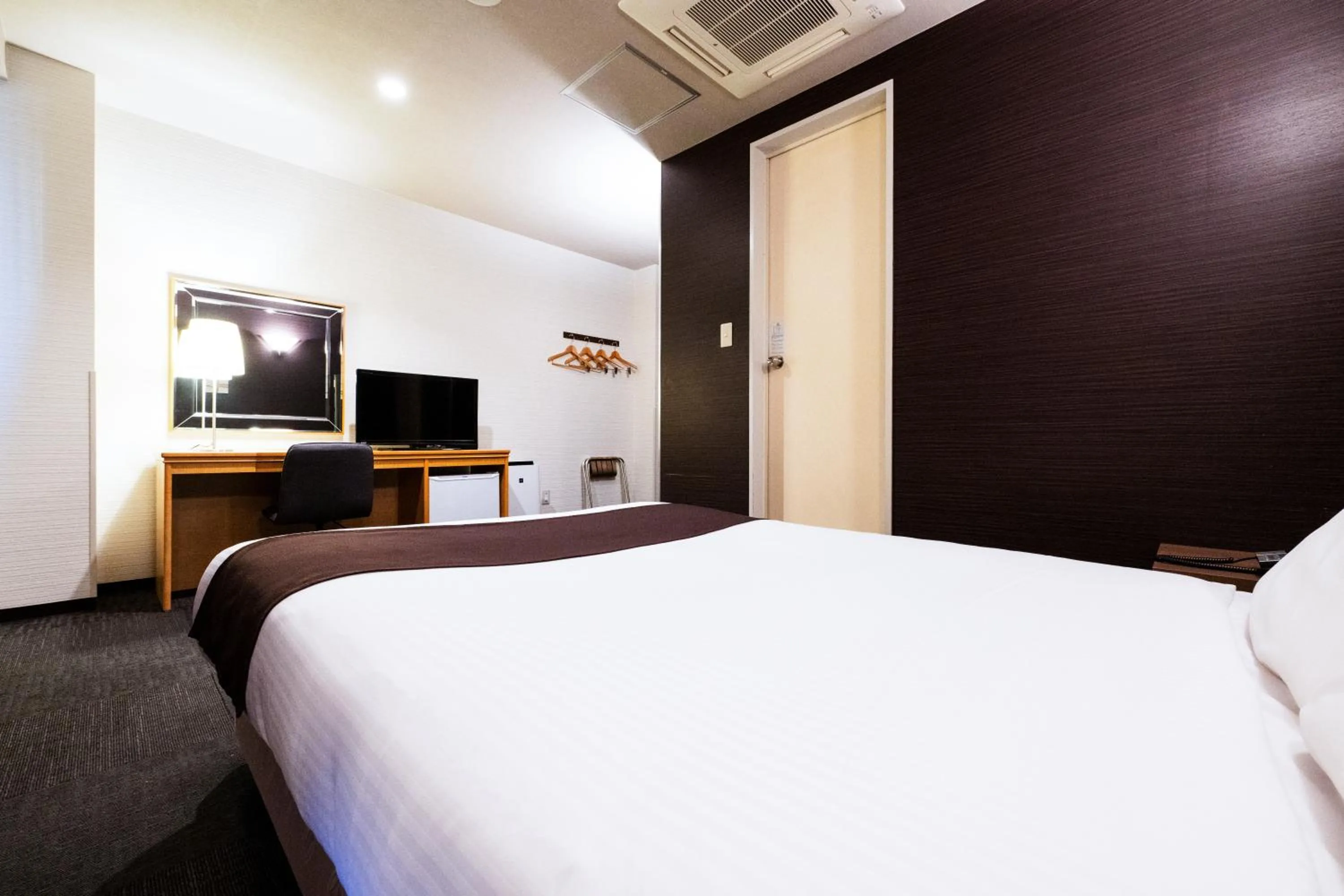 Photo of the whole room, Bed in Urvest Hotel Kamata