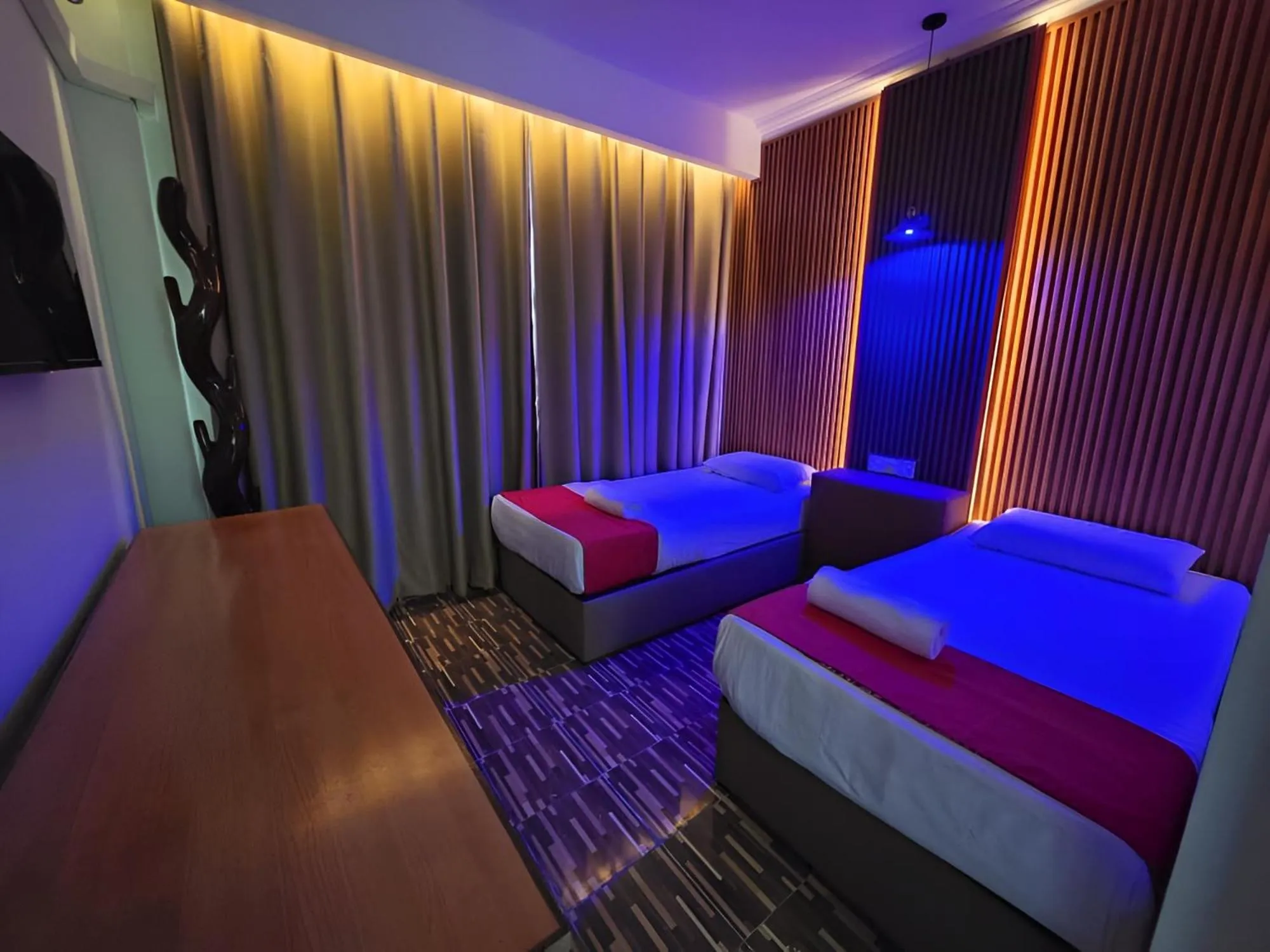 Bed in Grand Inn Hotel Semporna