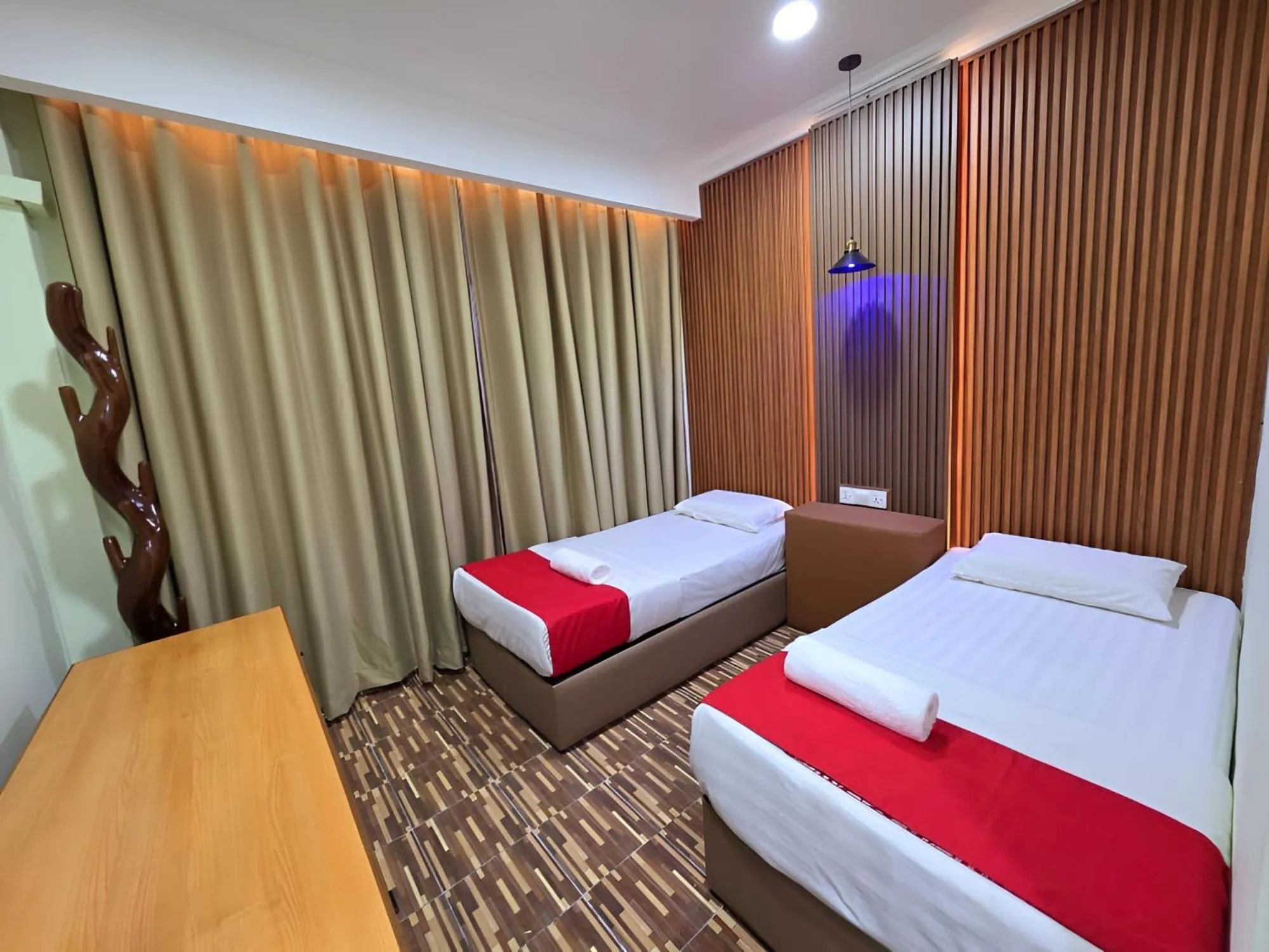 Bed in Grand Inn Hotel Semporna