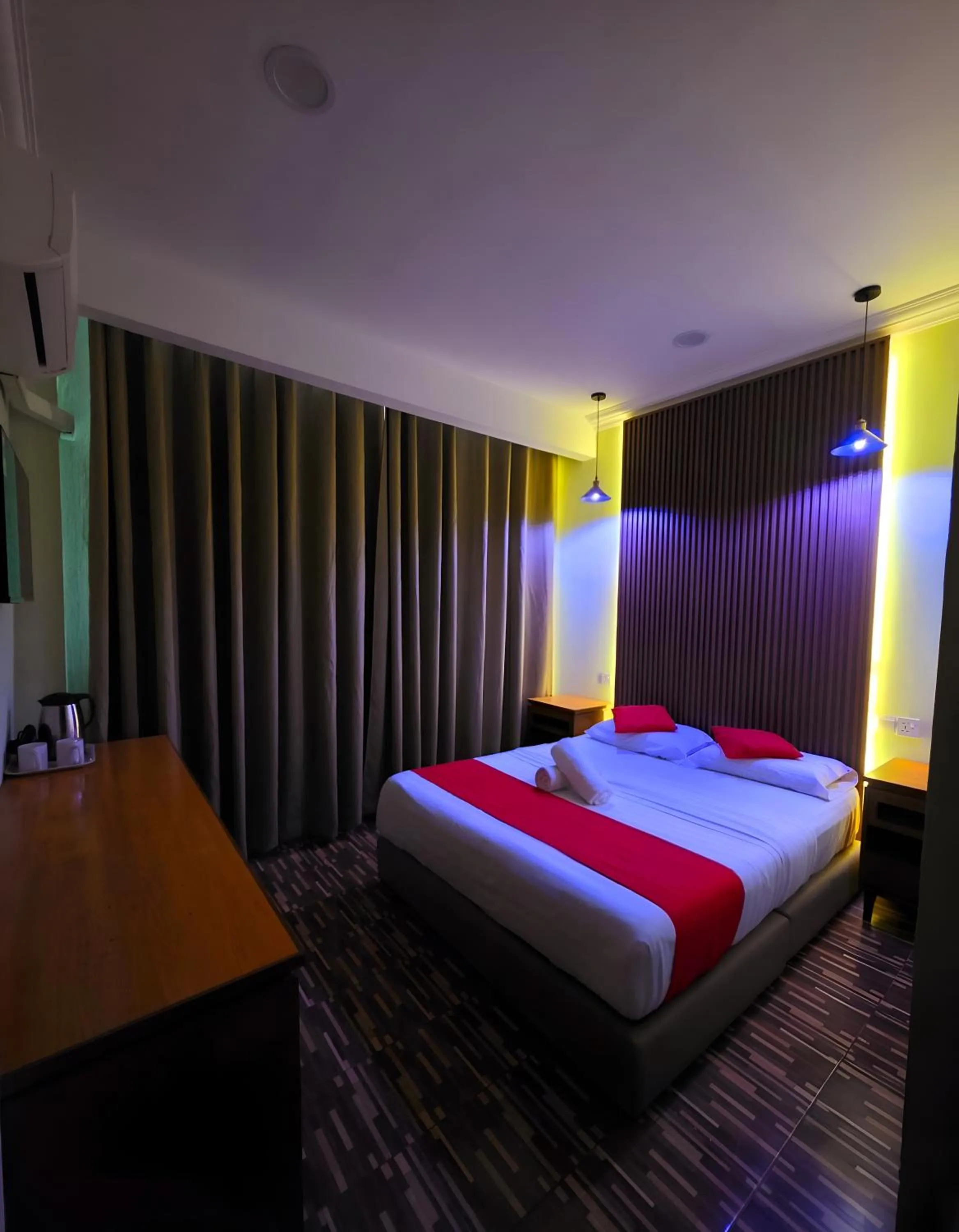 Bed in Grand Inn Hotel Semporna