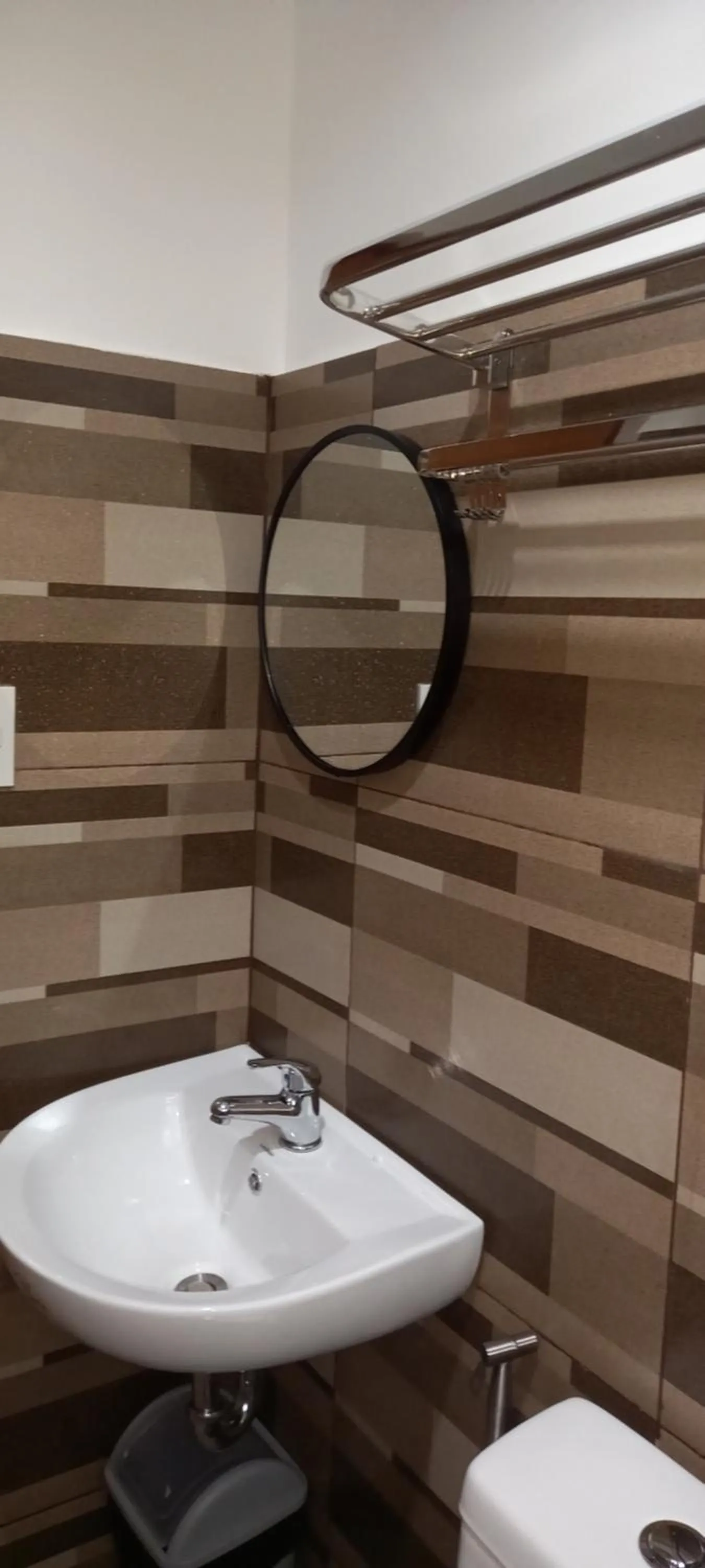 Toilet in Lorraine Suites