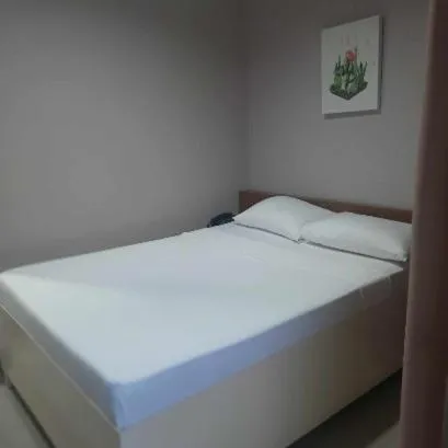 Bed in Lorraine Suites