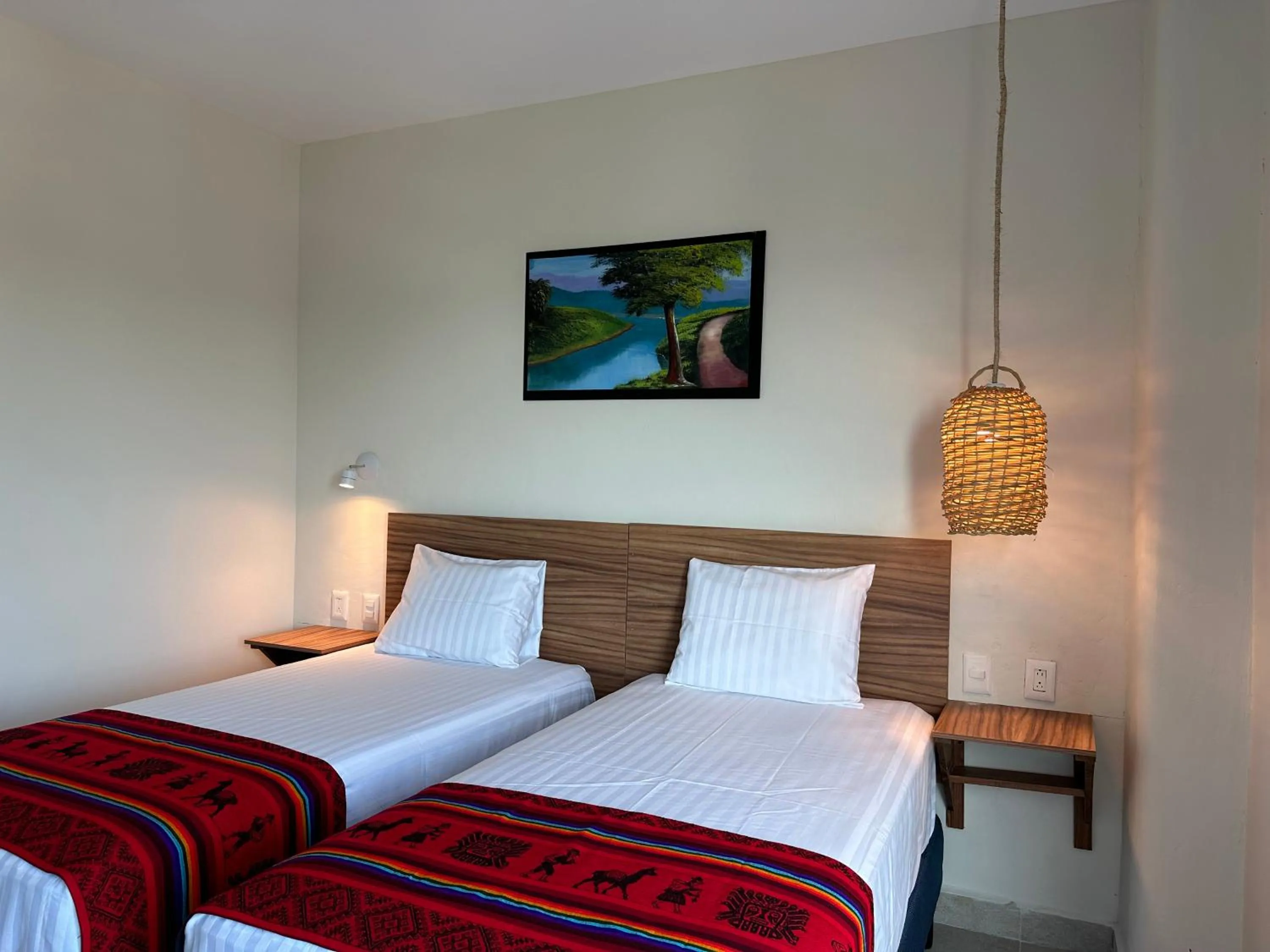 Bed in Oneiro Suites with Sea View