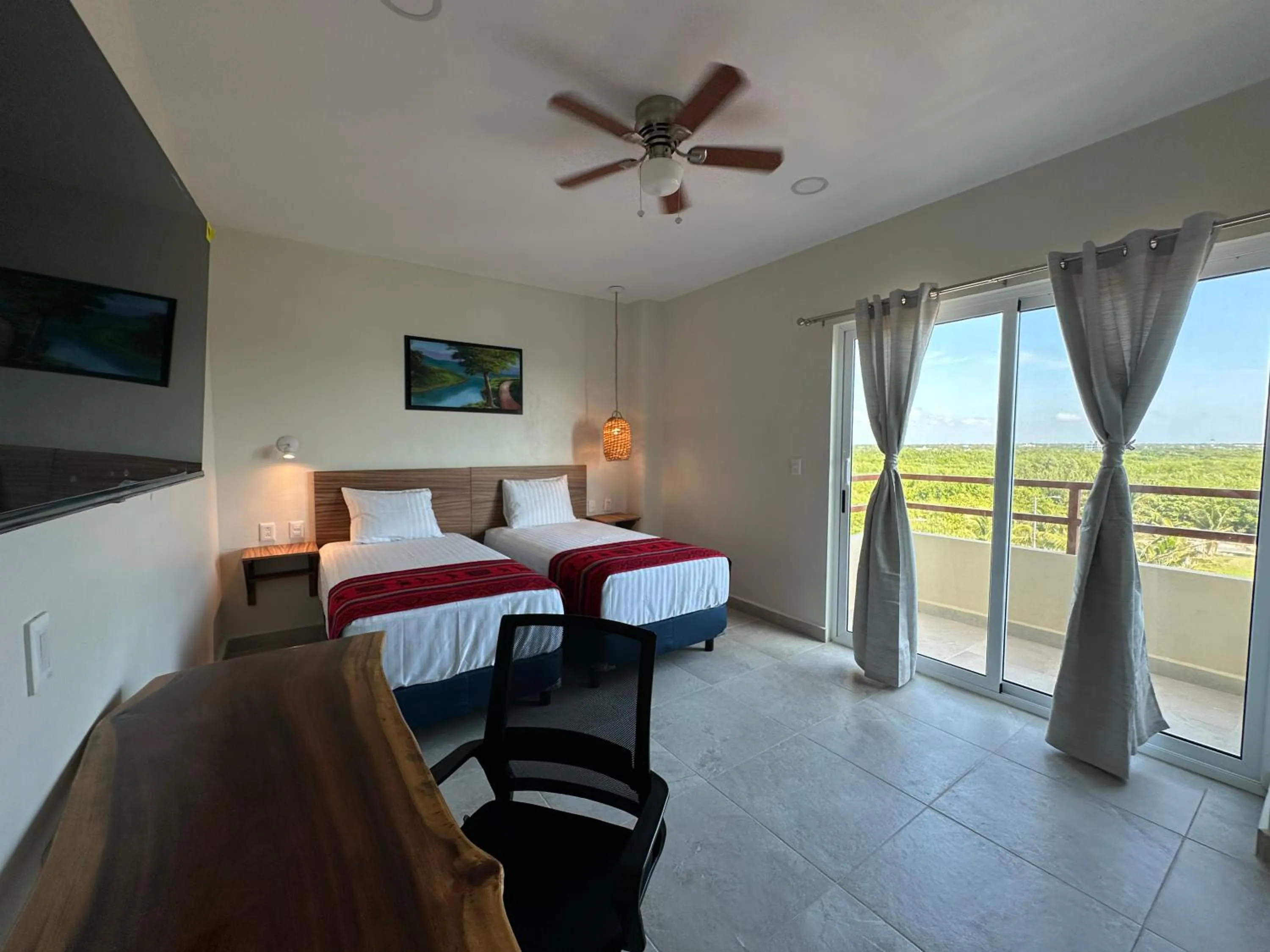 Bed in Oneiro Suites with Sea View