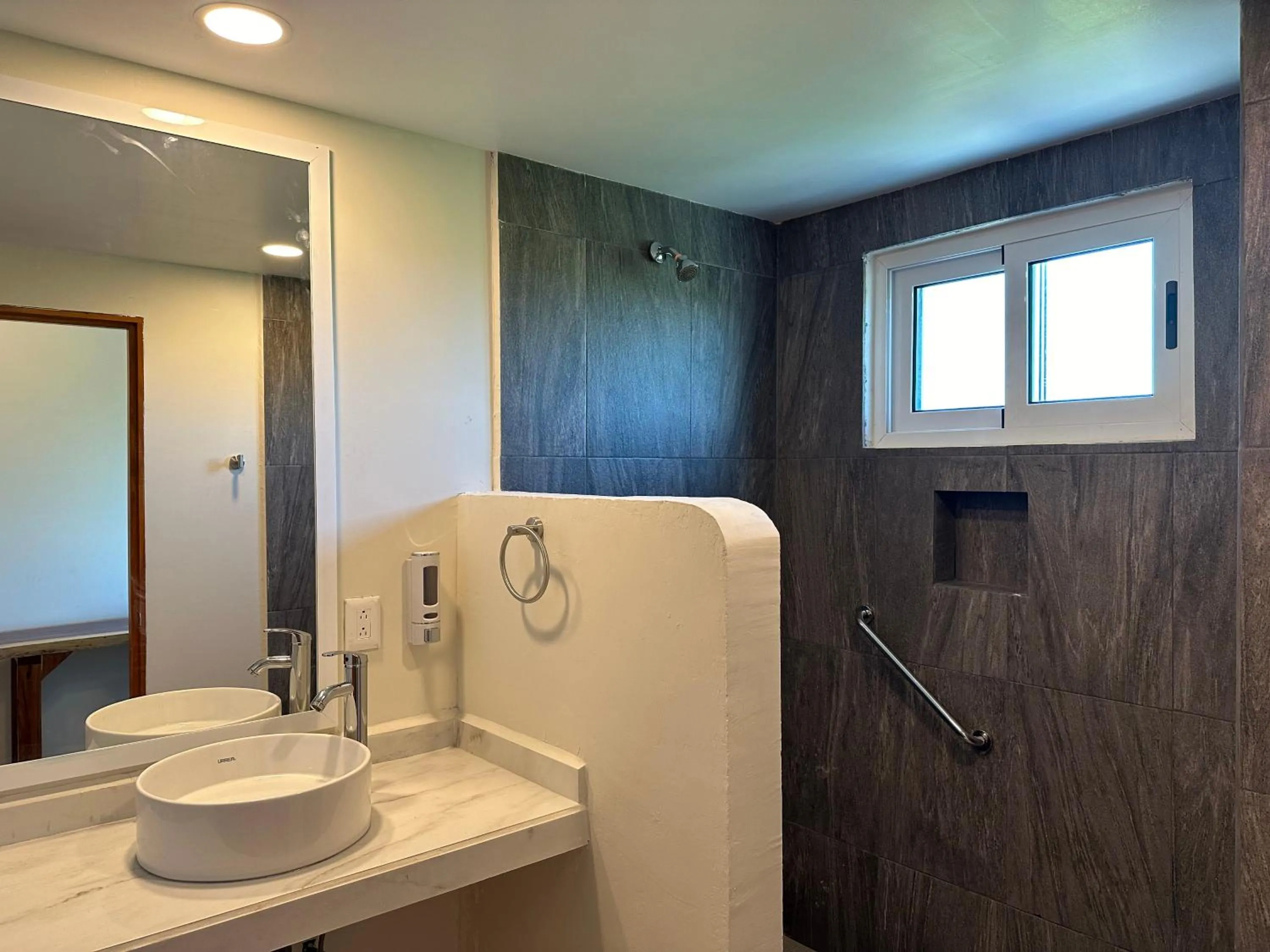 Bathroom in Oneiro Suites with Sea View