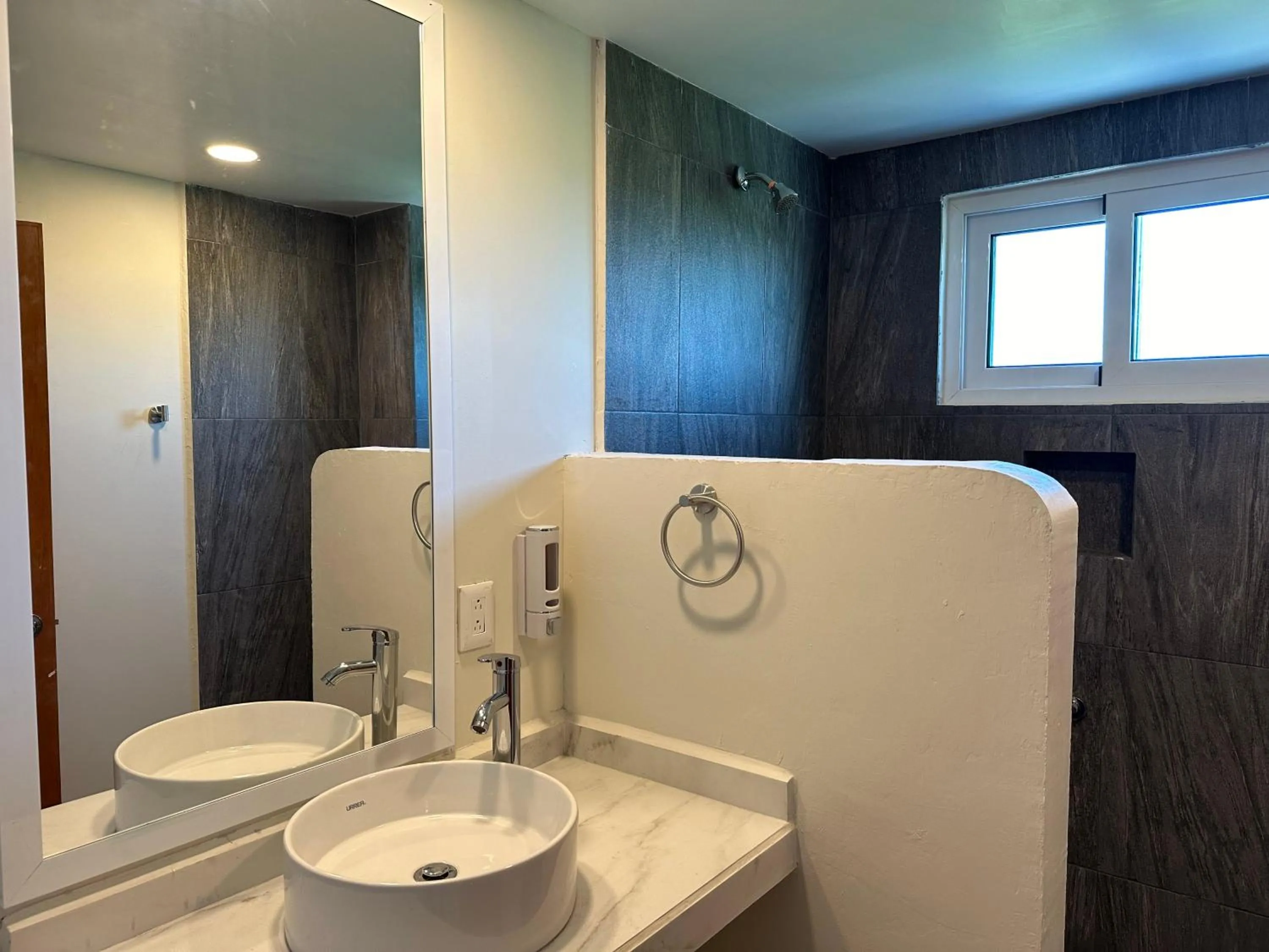 Bathroom in Oneiro Suites with Sea View