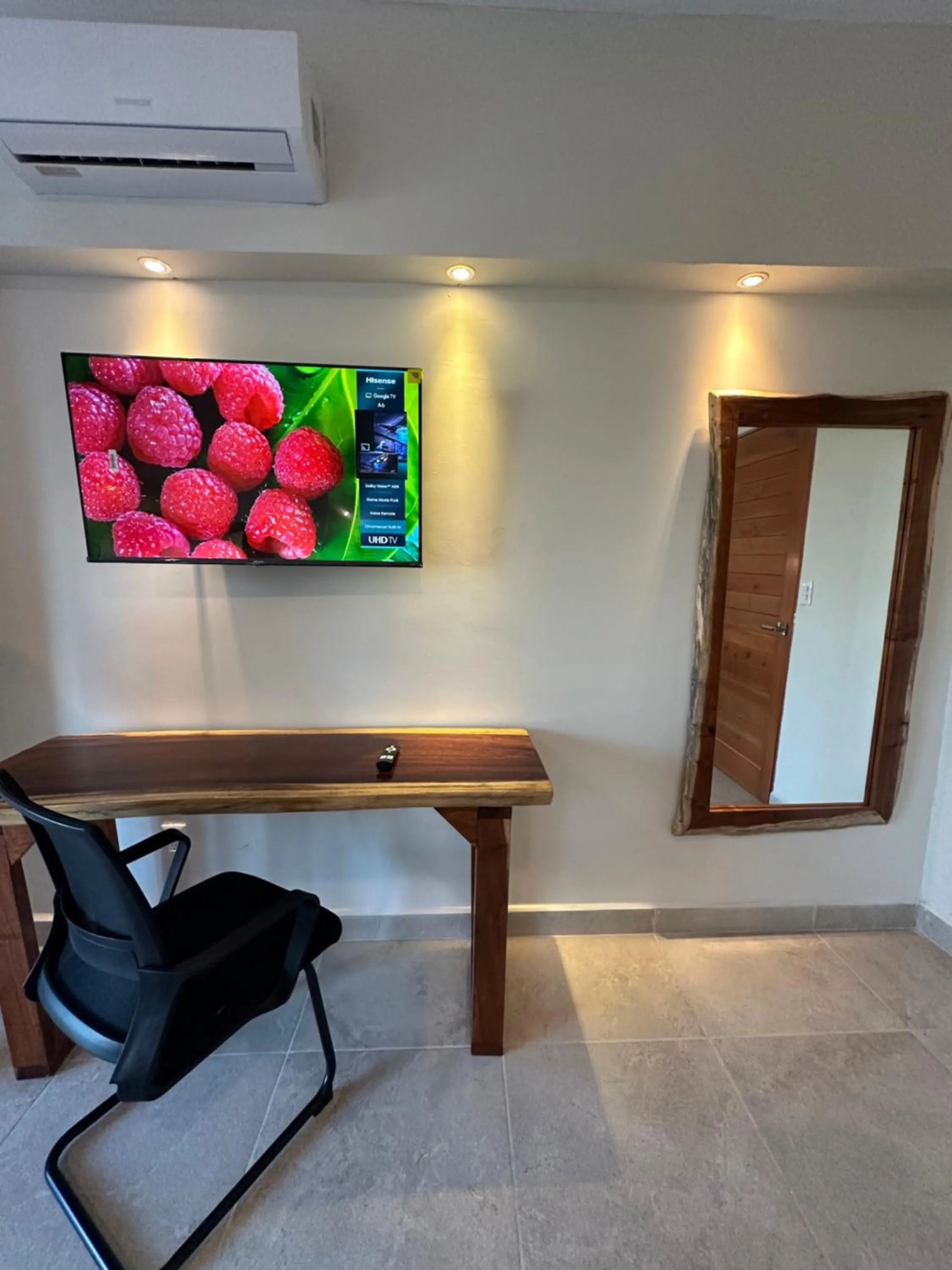TV and multimedia in Oneiro Suites with Sea View