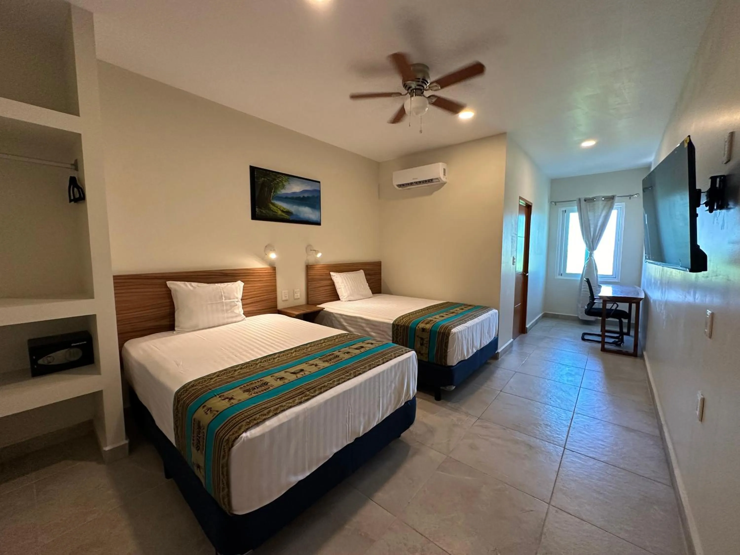 Bed in Oneiro Suites with Sea View