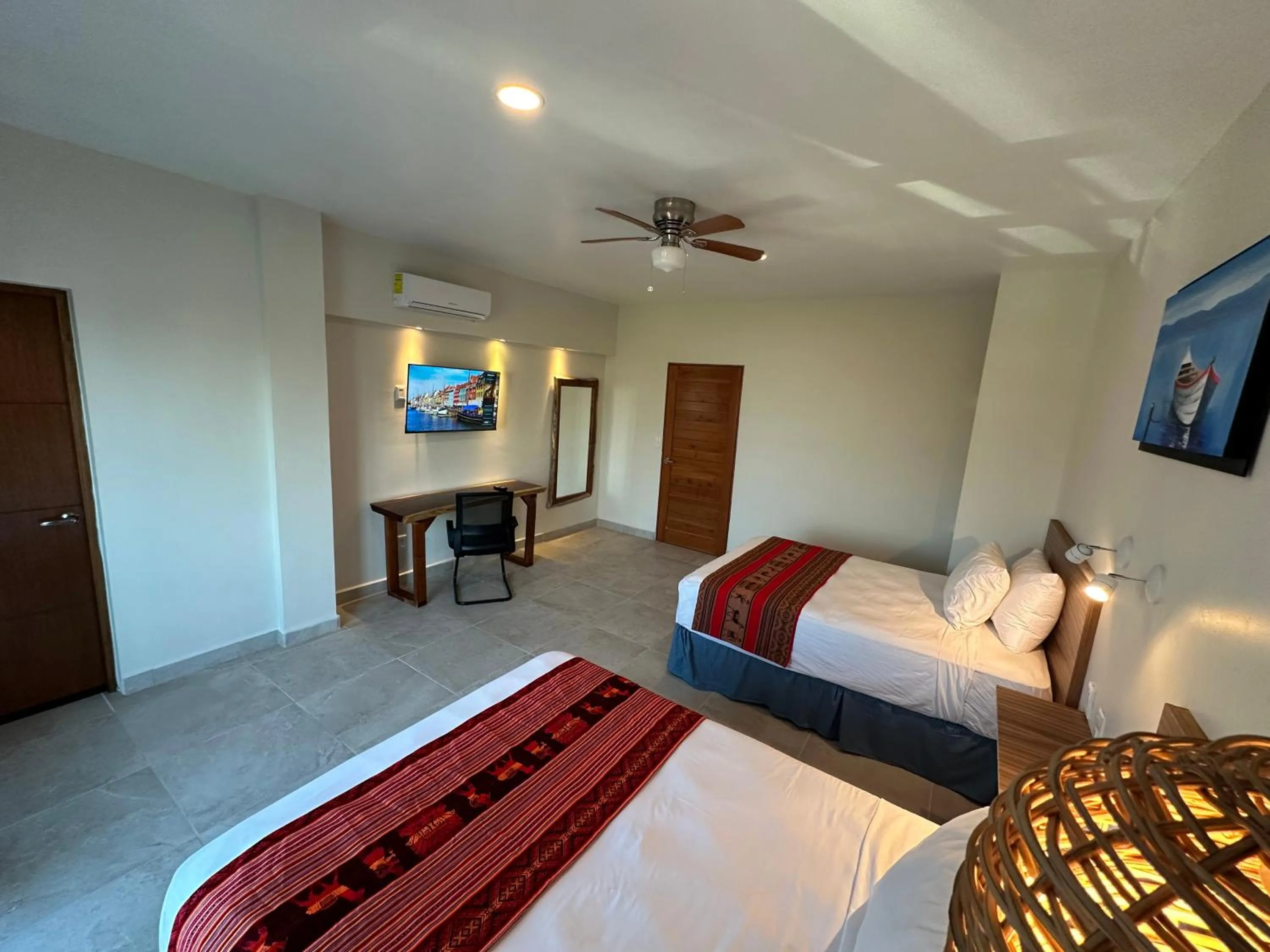 Bed in Oneiro Suites with Sea View