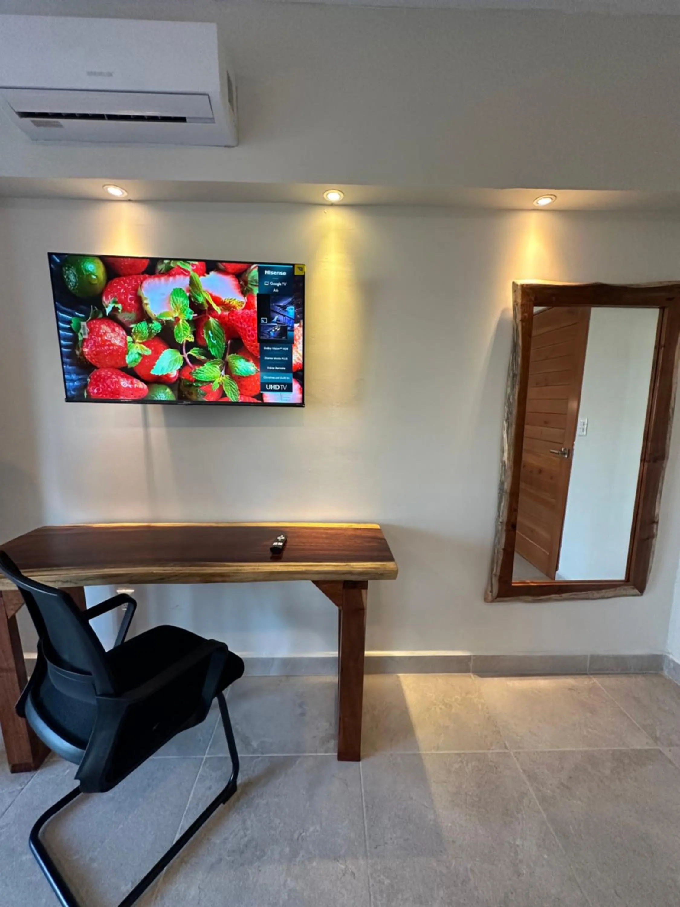 TV and multimedia in Oneiro Suites with Sea View