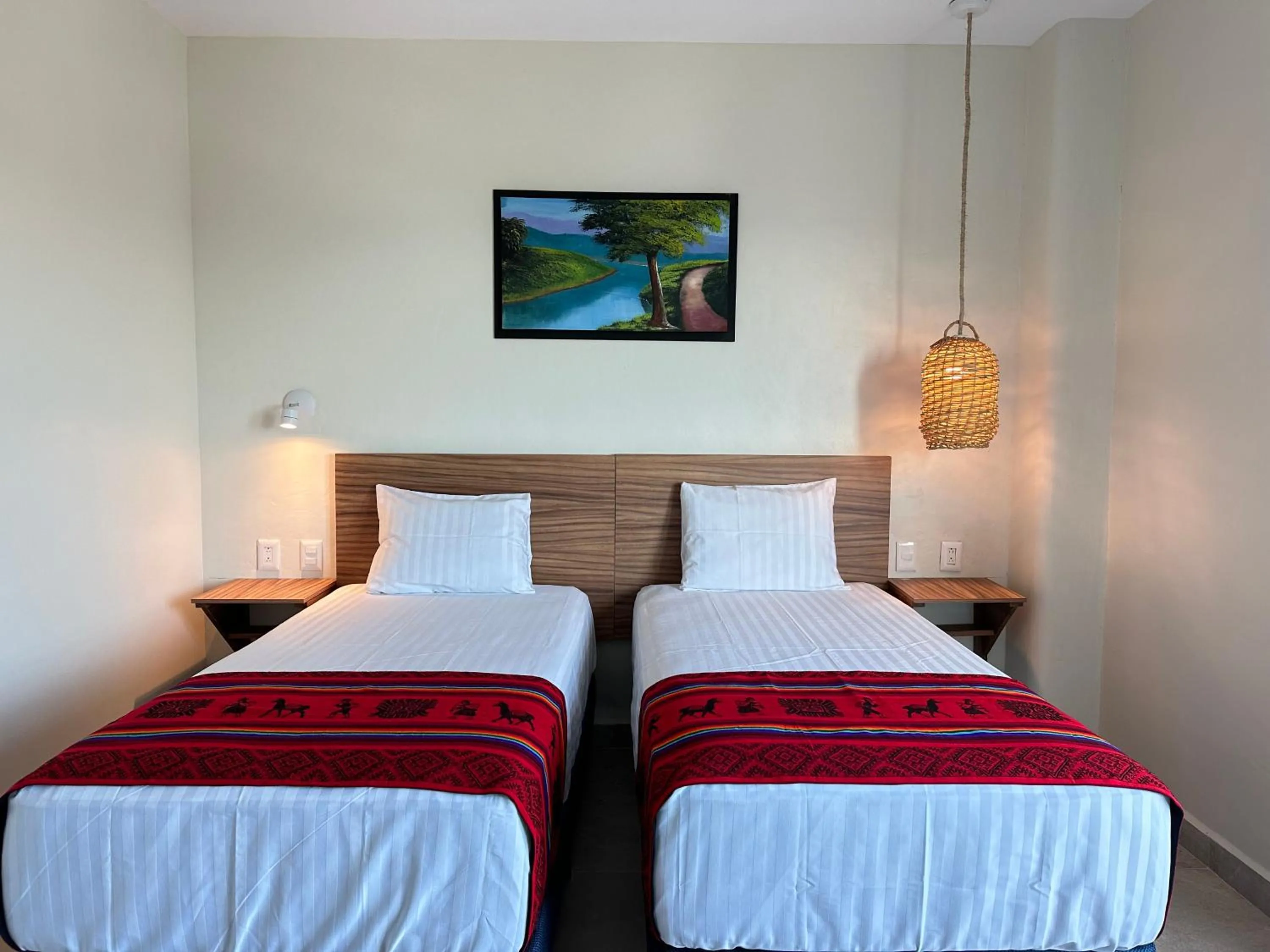 Bed in Oneiro Suites with Sea View