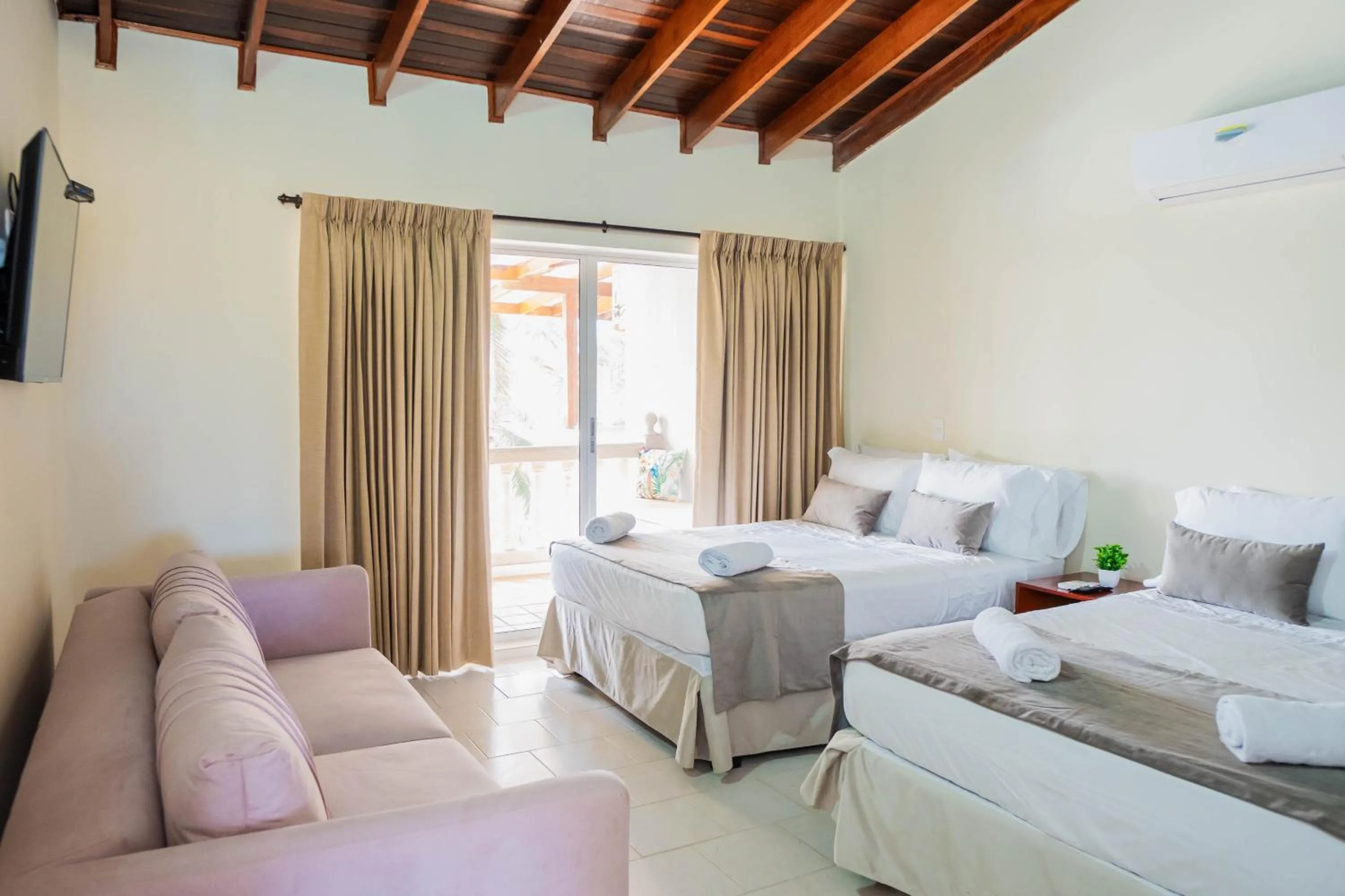 Bed in Hotel Playa Palmeras Cartagena - Vía al Mar