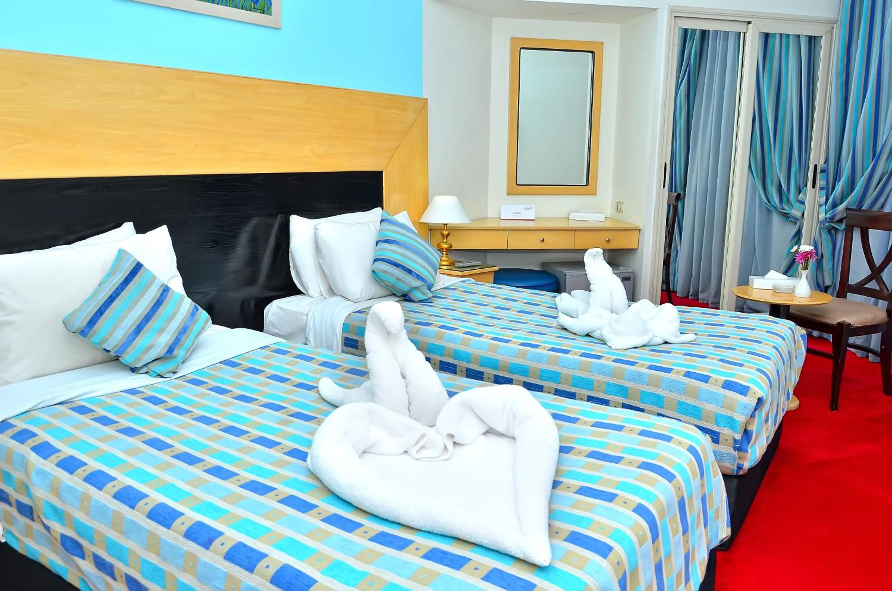 Bed in Aracan Pyramid Hotel