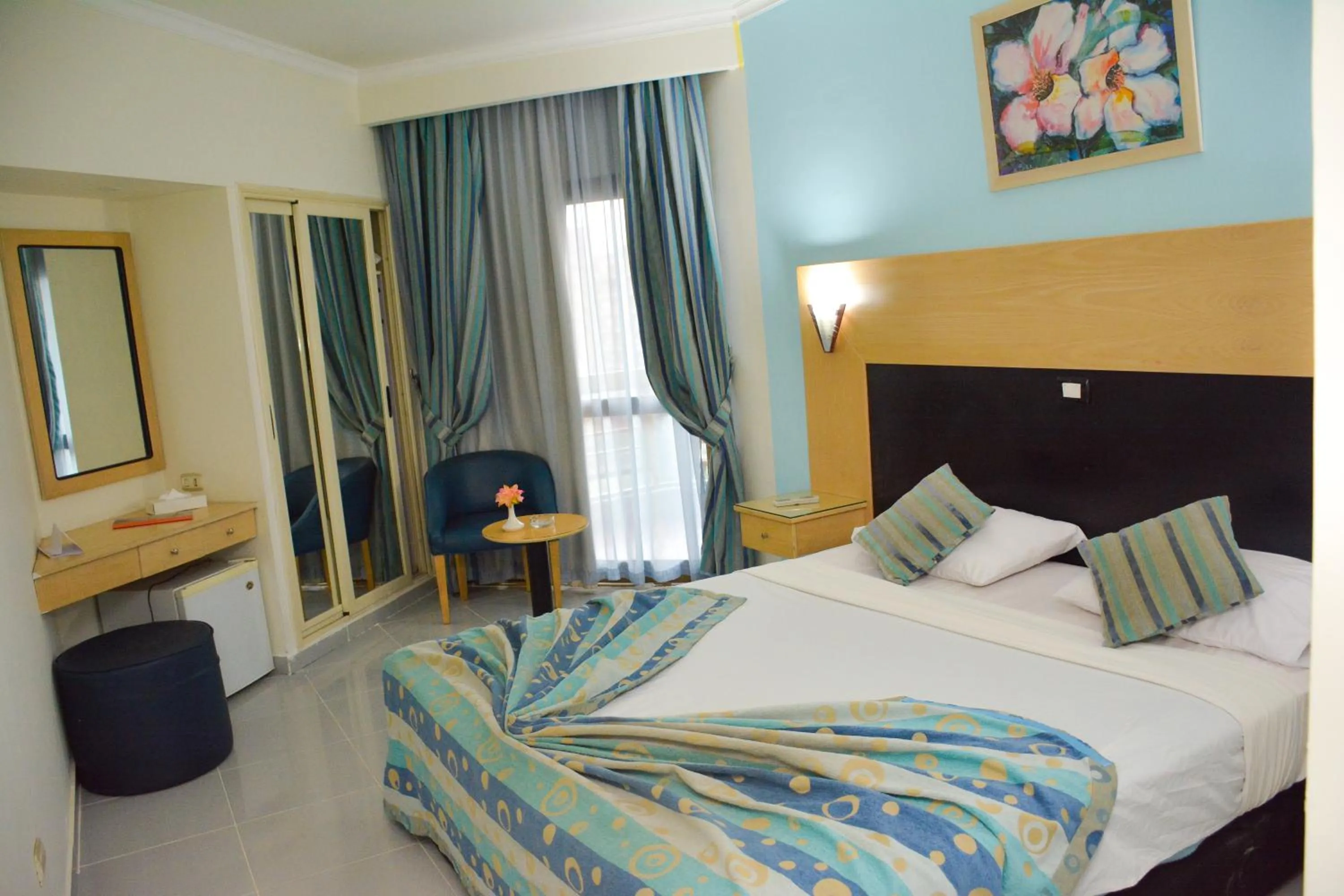 Bed in Aracan Pyramid Hotel