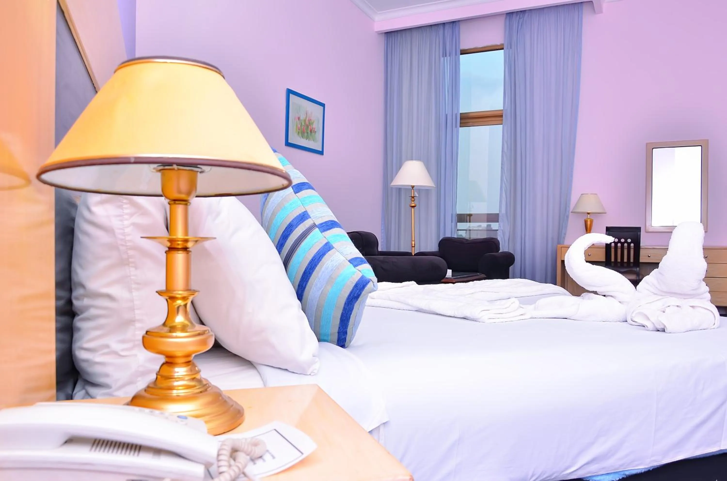 Bed in Aracan Pyramid Hotel