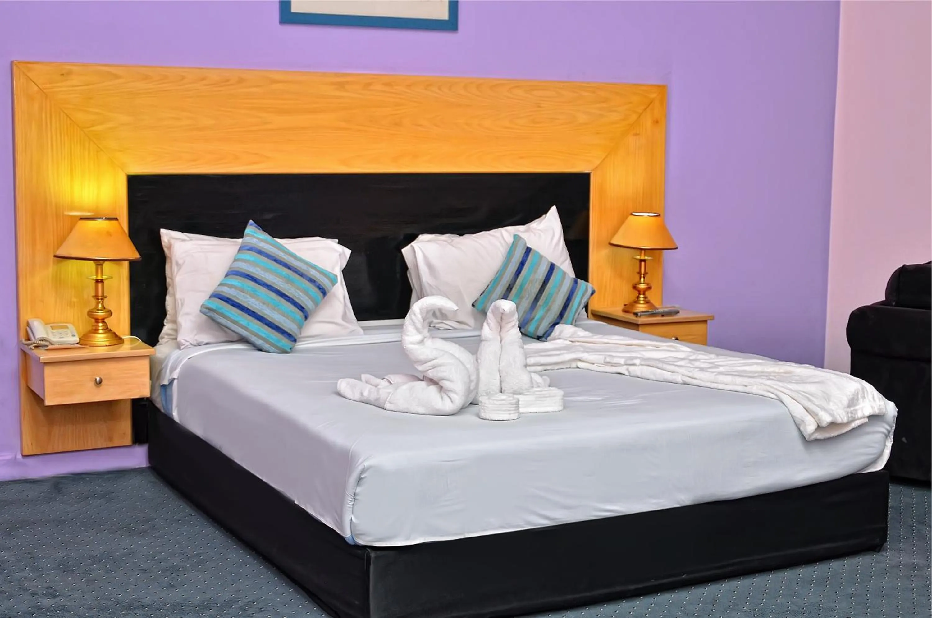 Bed in Aracan Pyramid Hotel